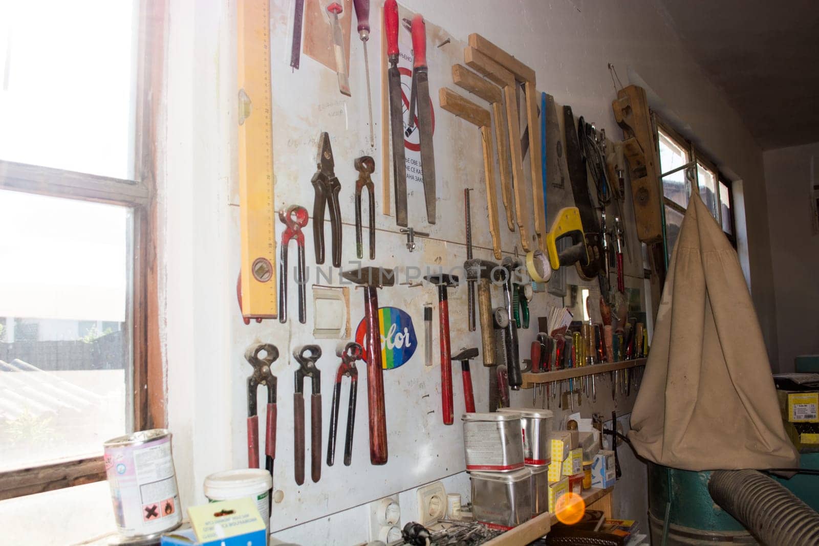 Shelves with tools in carpenters workshop