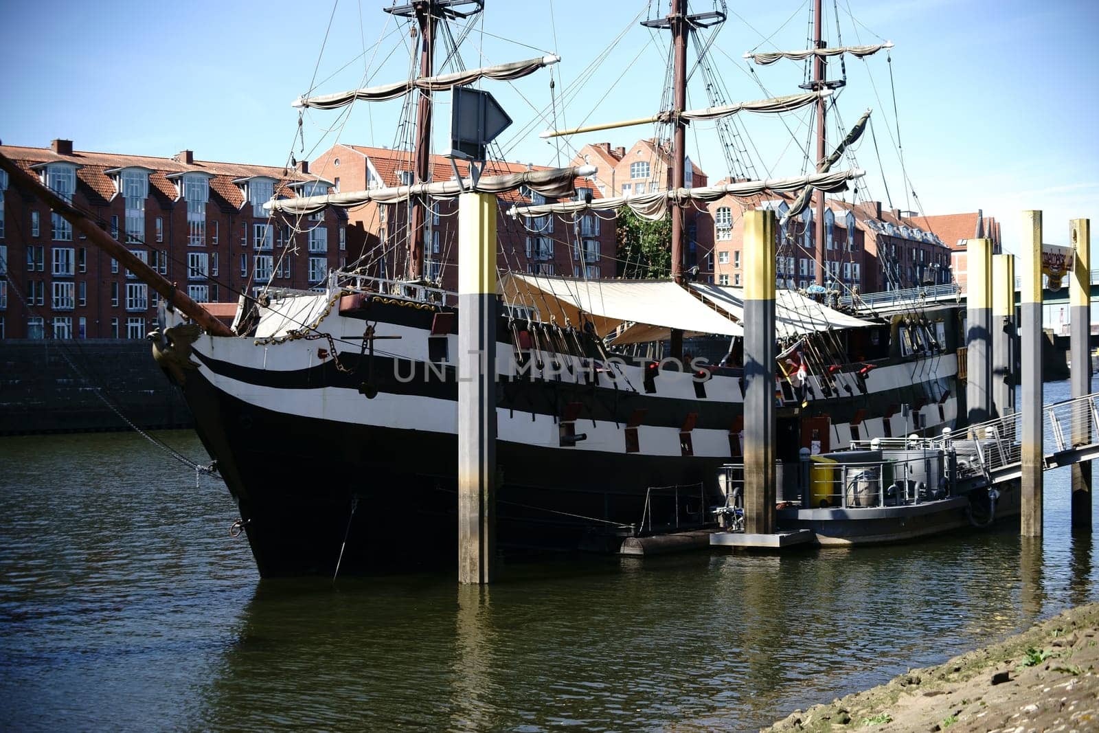 Bremen,Germany - August 30,2016: The Pannekoeken Schip Admiral Nelson,the replica of a frigate on the banks of the Weser on August 30,2016 in Bremen.