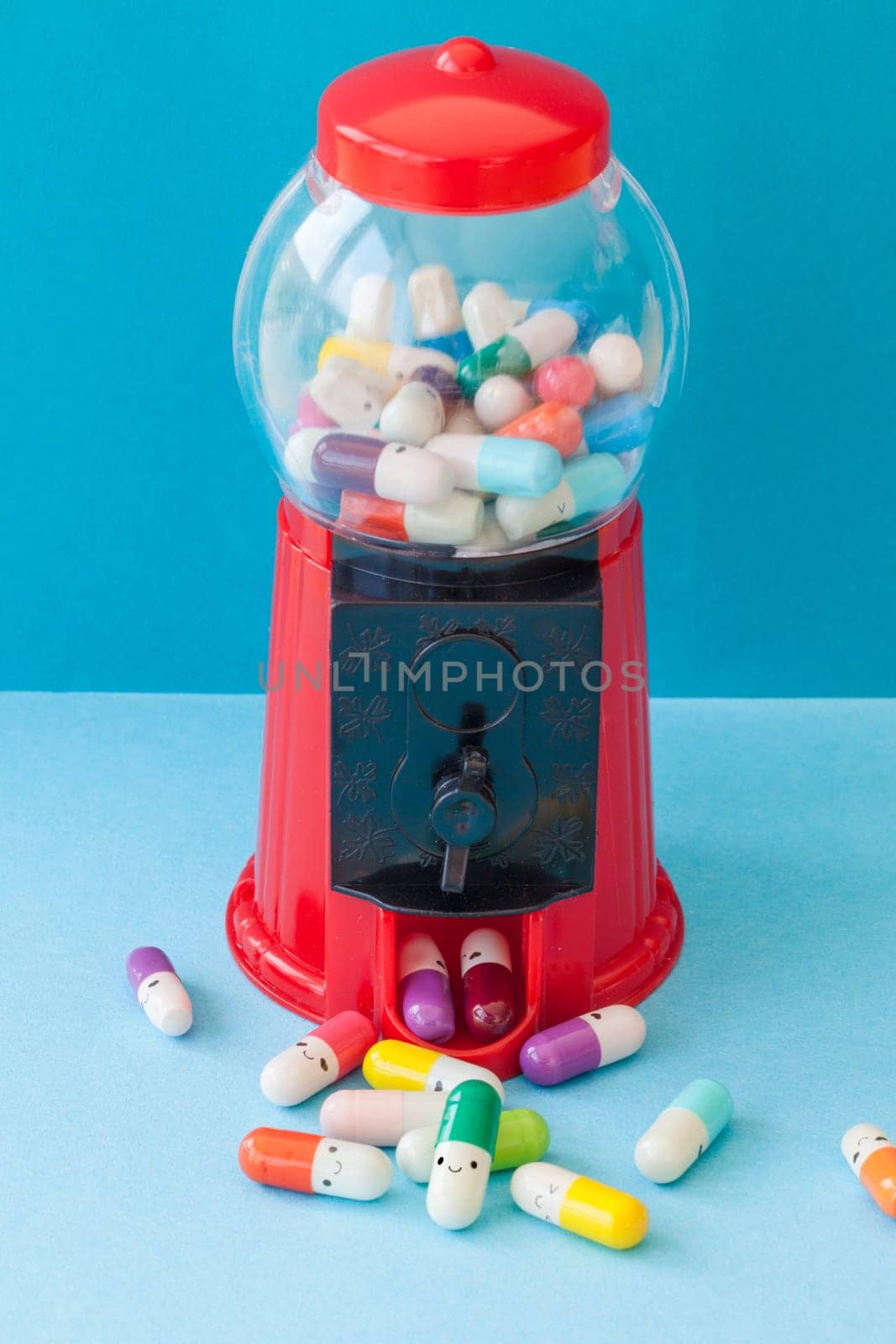 Colorful pill with froehlichen faces,mental health concept
