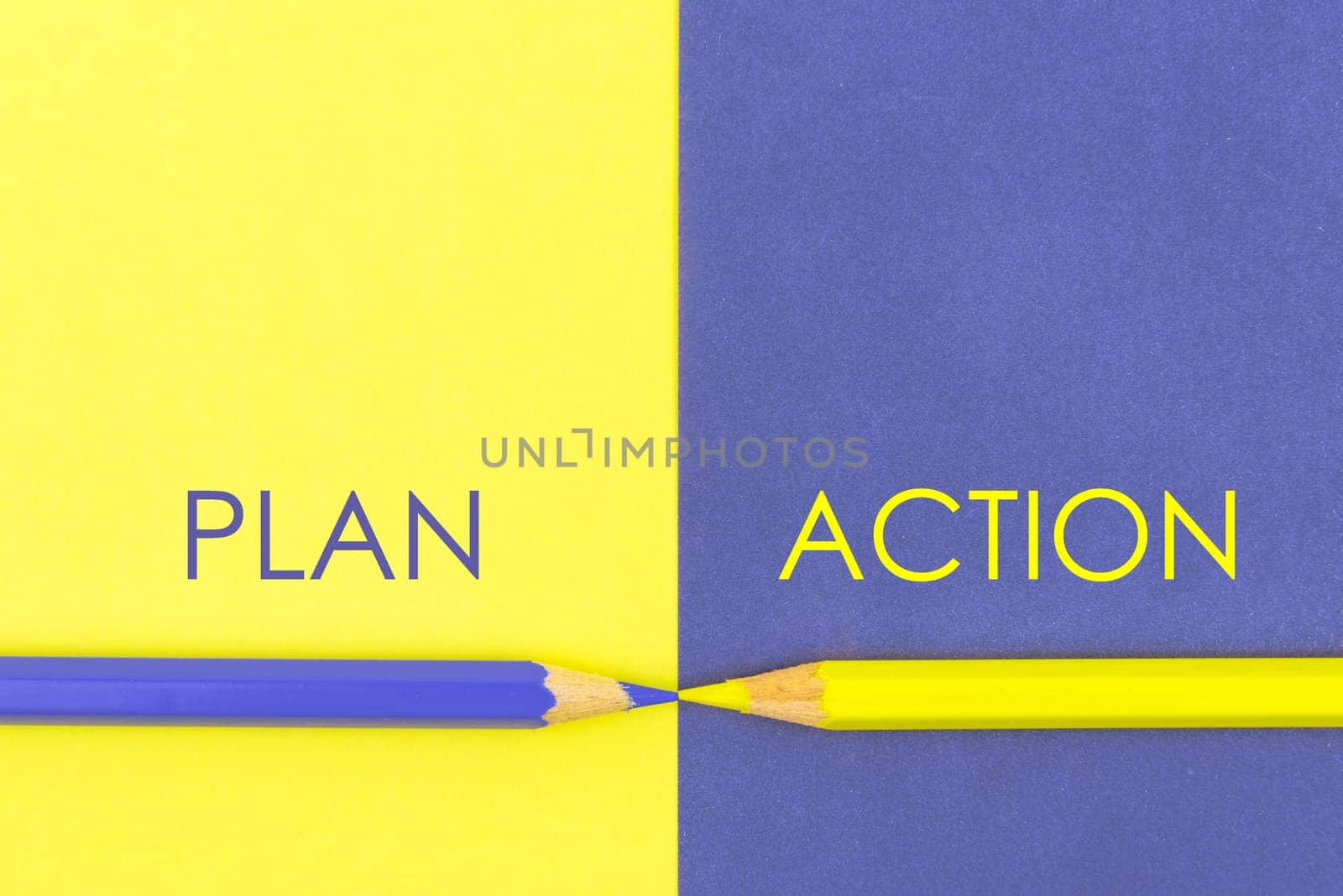 Plan versus Action contrast concept . Yellow and Violet coloured pencils and paper.