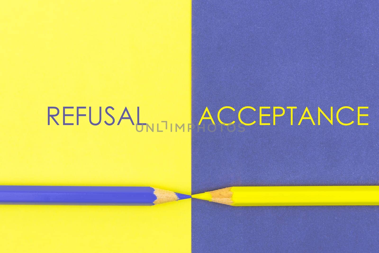 Refusal versus Acceptance contrast concept . Yellow and Violet coloured pencils and paper.