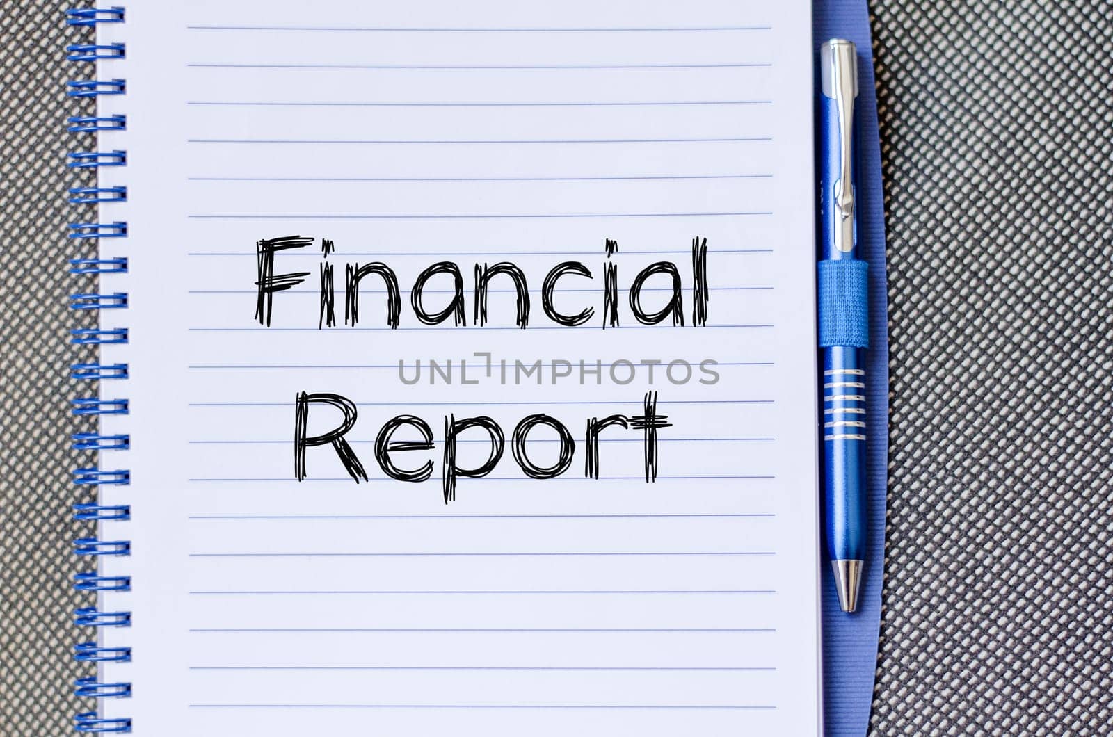 Financial report text concept write on notebook