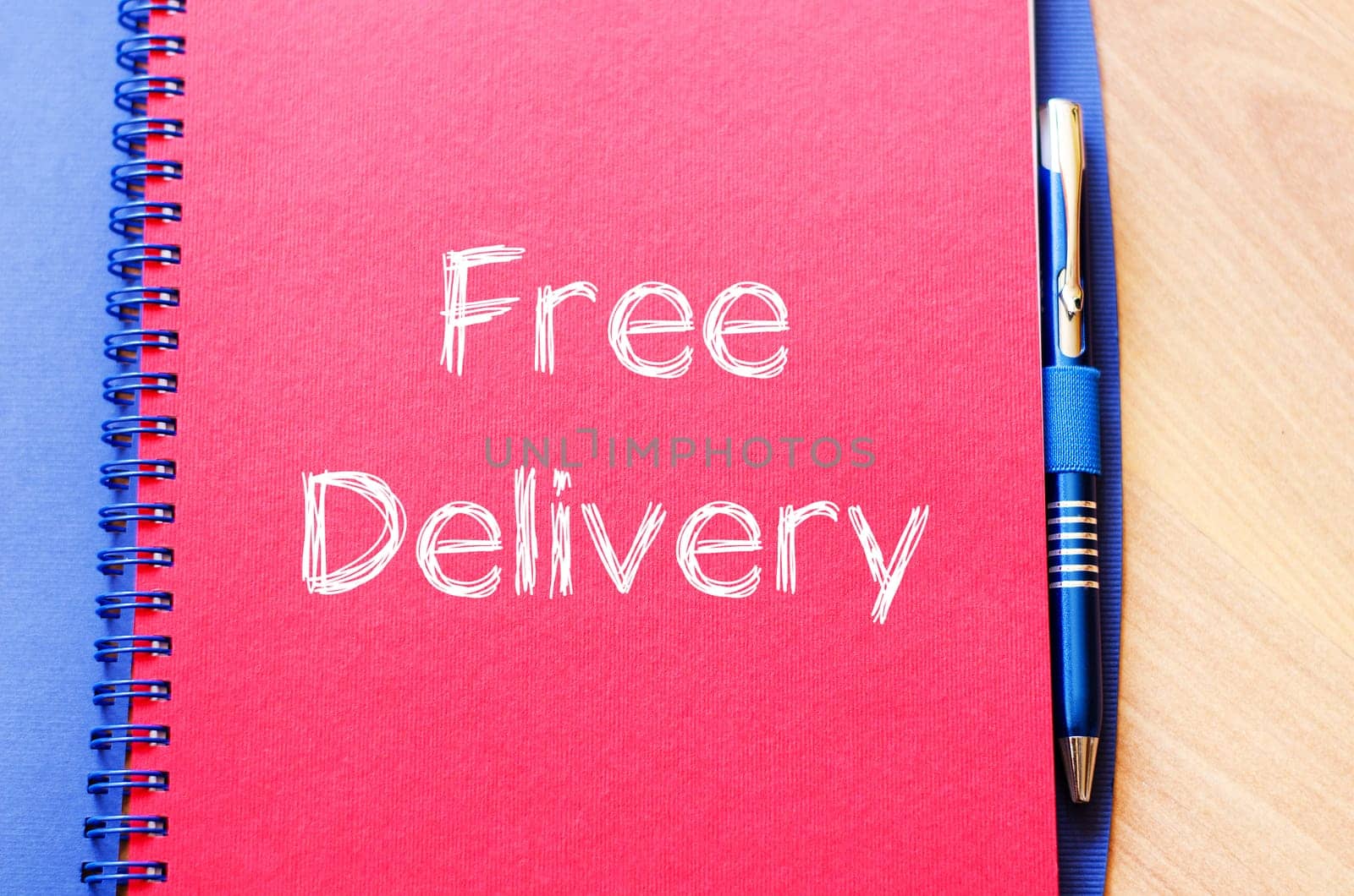 Free delivery text concept write on notebook