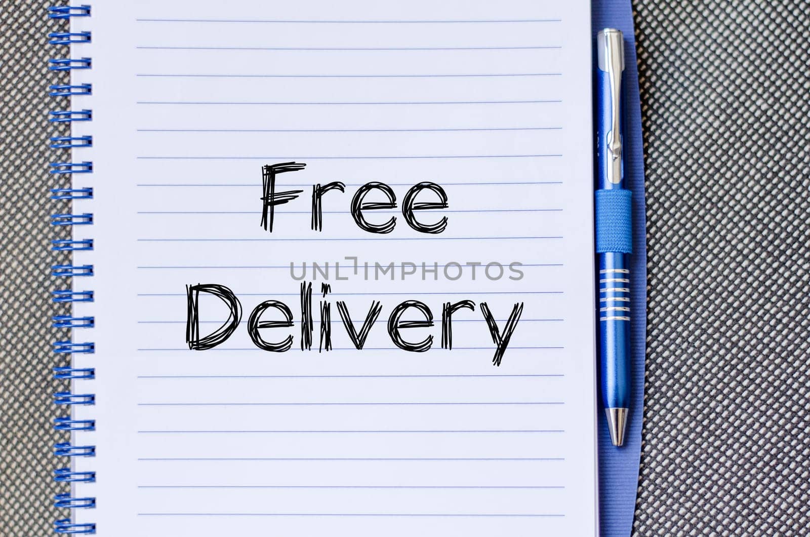 Free delivery text concept write on notebook