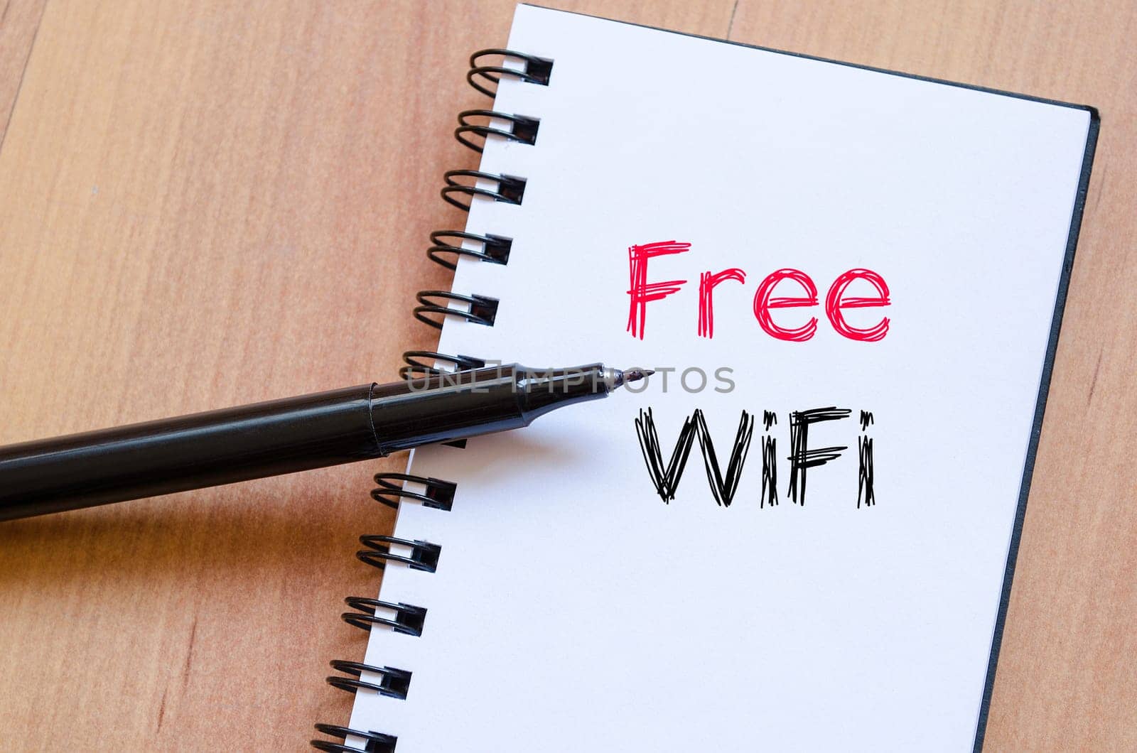 Free wifi text concept write on notebook