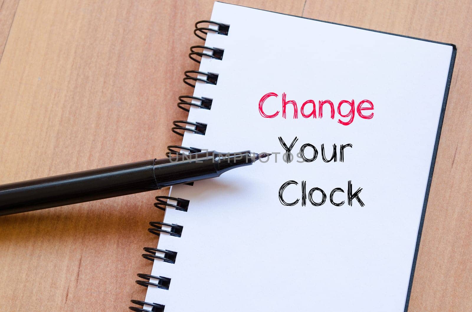 Change your clock text concept write on notebook