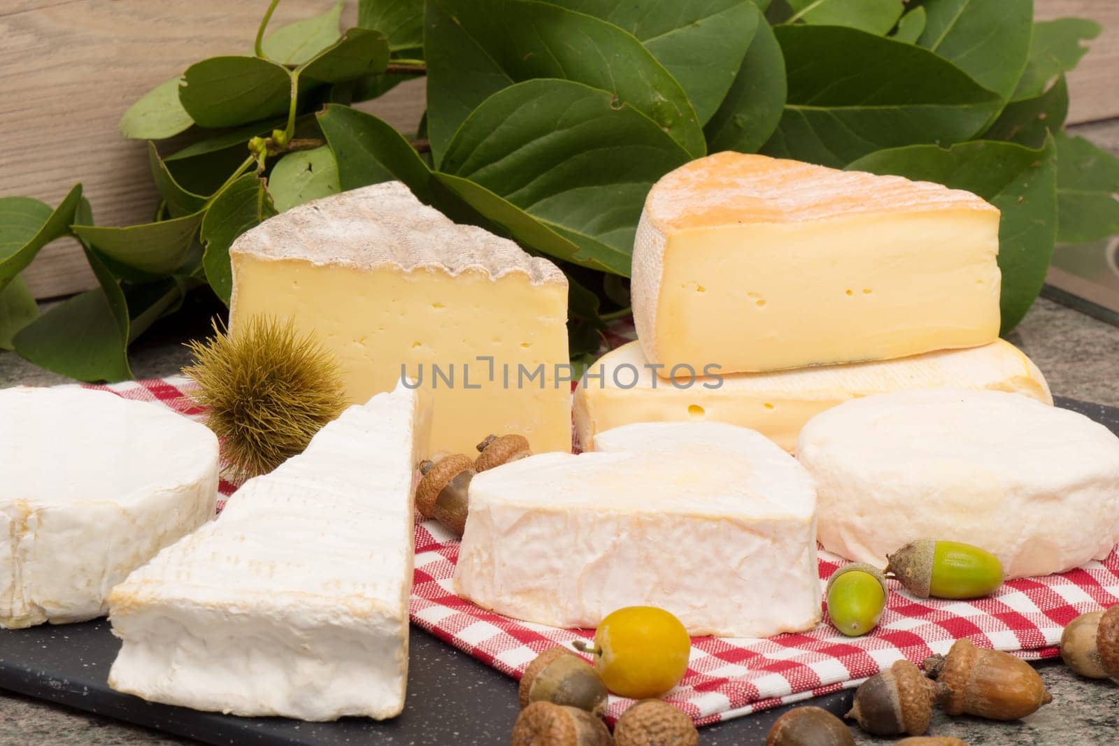 the different french cheese on a slate