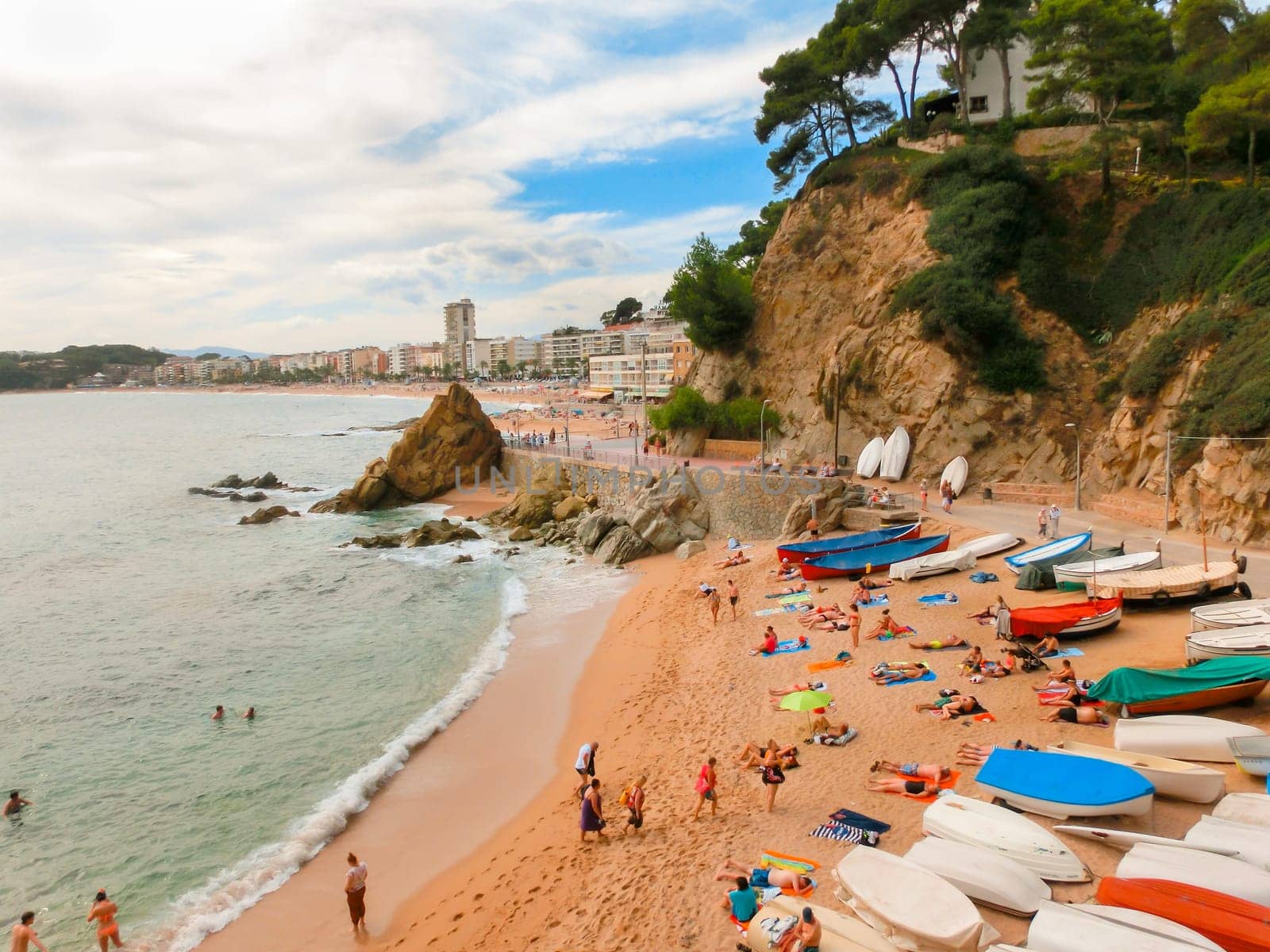 LLORET DE MAR, SPAIN - SEPTEMBER 14, 2015: The beach in costa Brava of Catalonia Spain