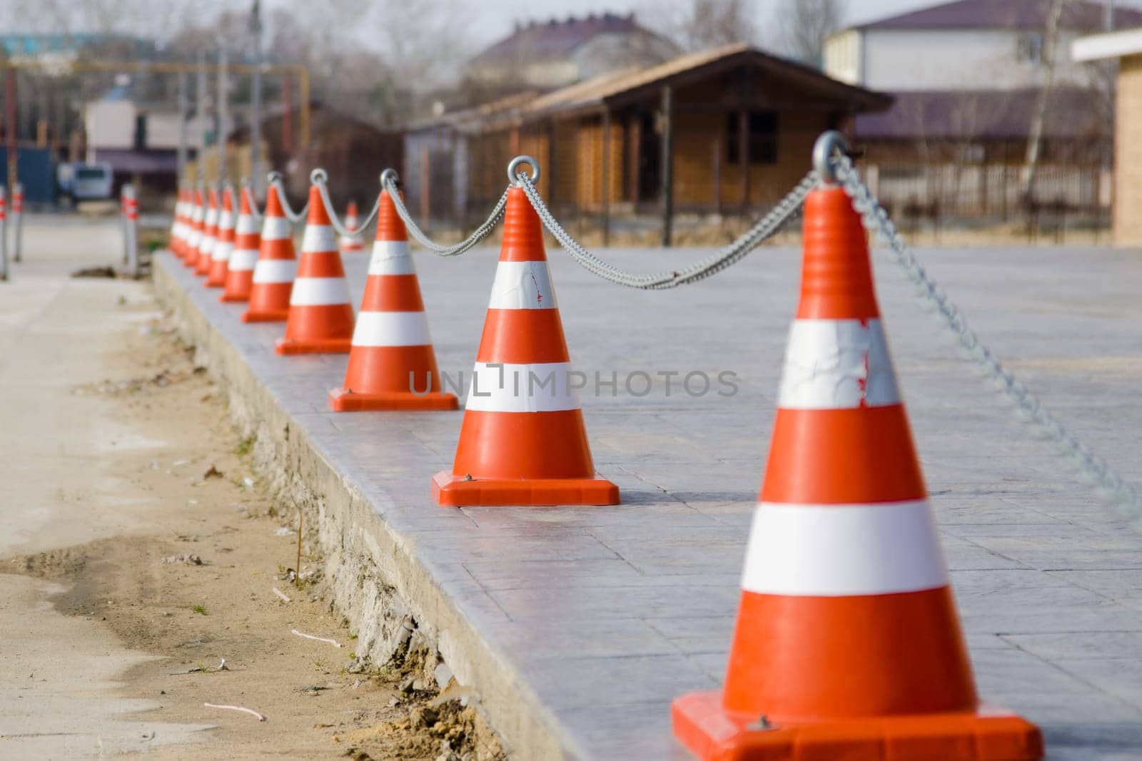 Fencing the territory of the plastic cones connected by a chain