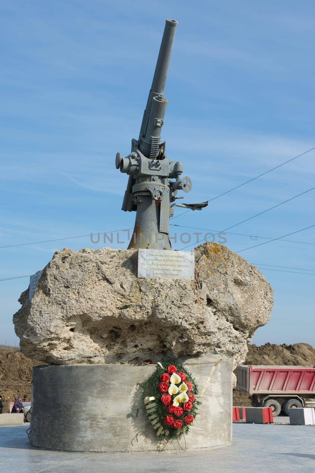 Taman, Russia - March 8, 2016: View of the monument to the Soviet paratroopers in the Tuzla Spit - Lender gun with armored BKA 73 Azov flotilla Black Sea Fleet, who died 11.02.1943 in Kerch-Eltigen Operation