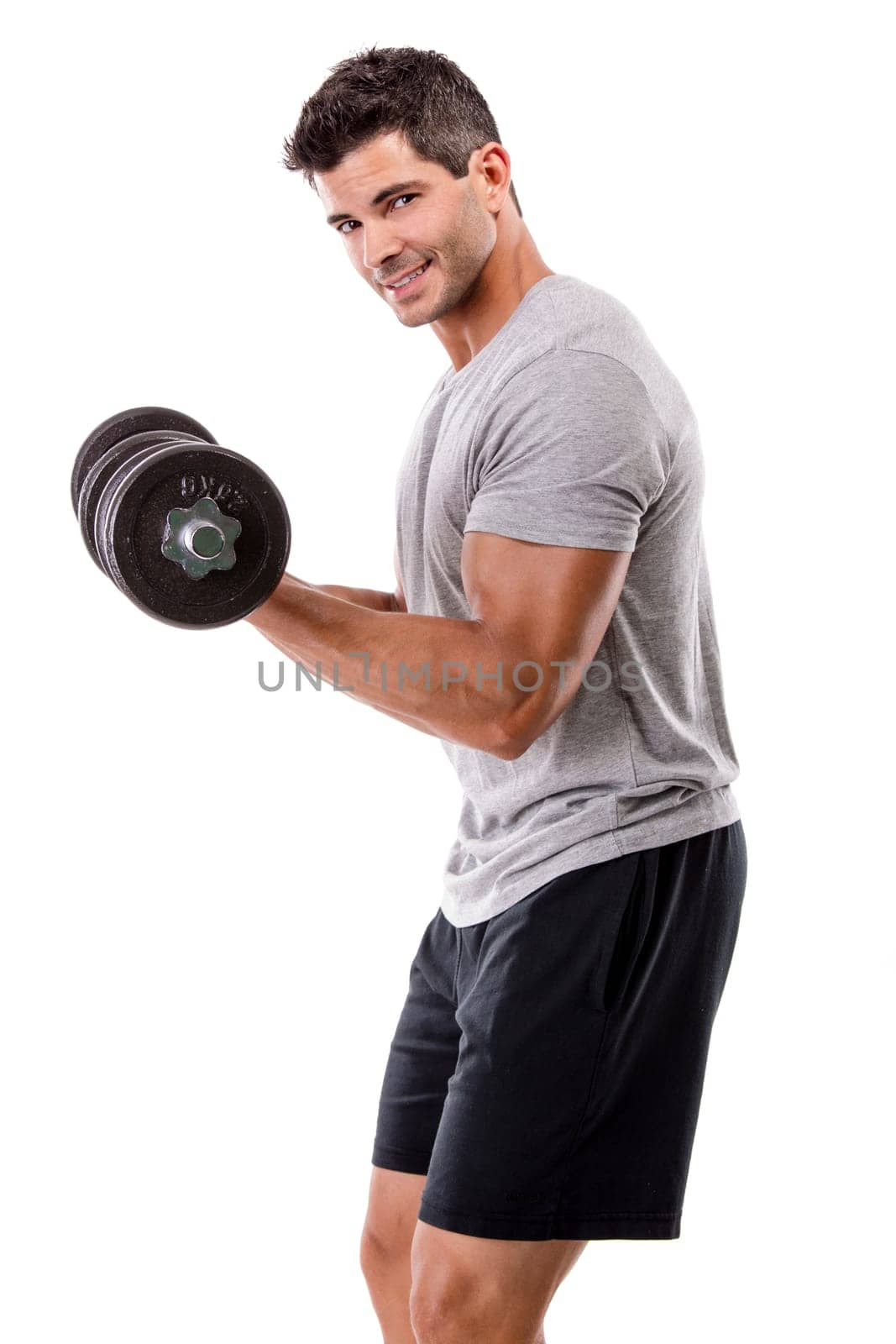 Portrait of a muscular man lifting weights, isolated over a white background