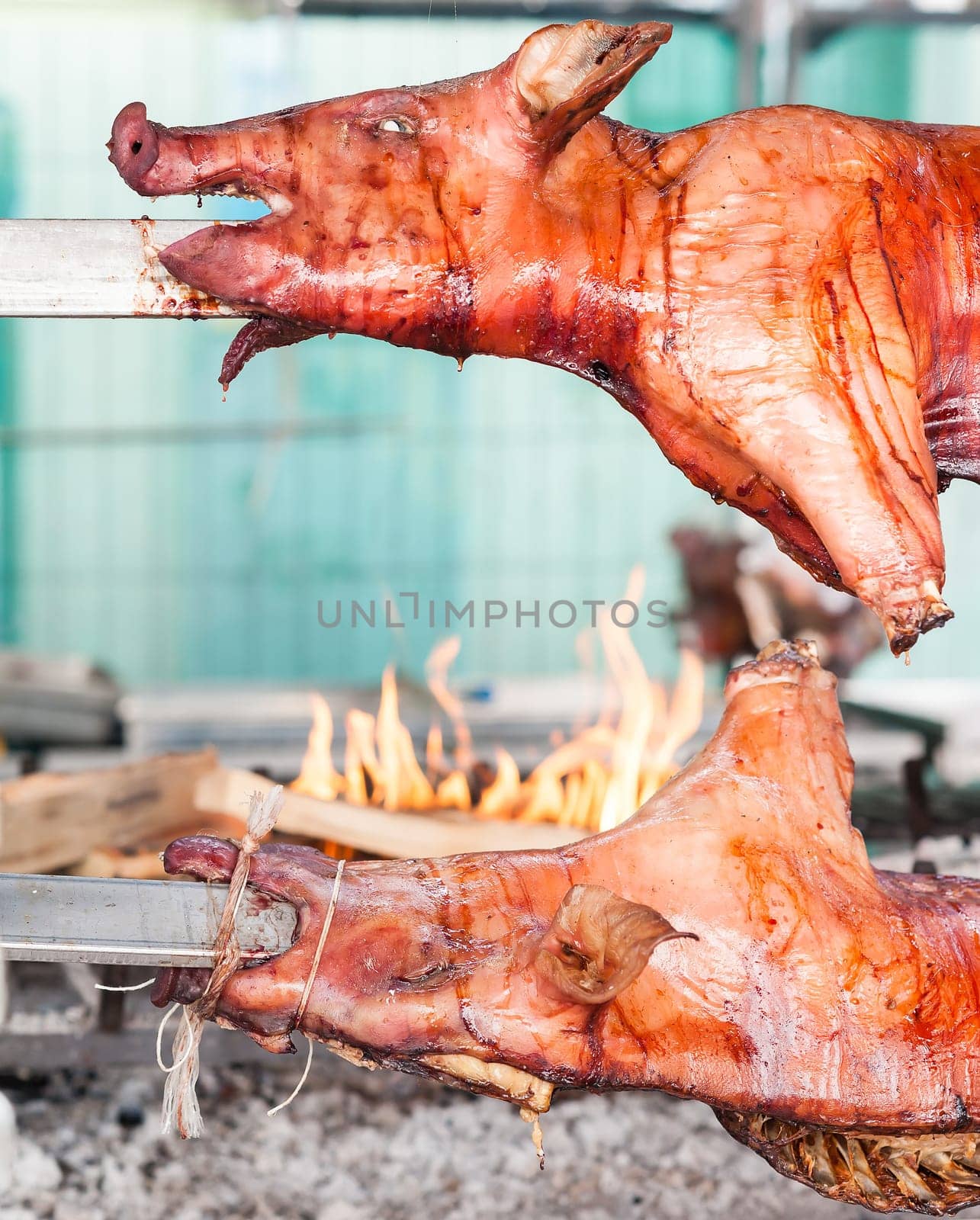 Baked roasted pork carcasses on the barbecue.
