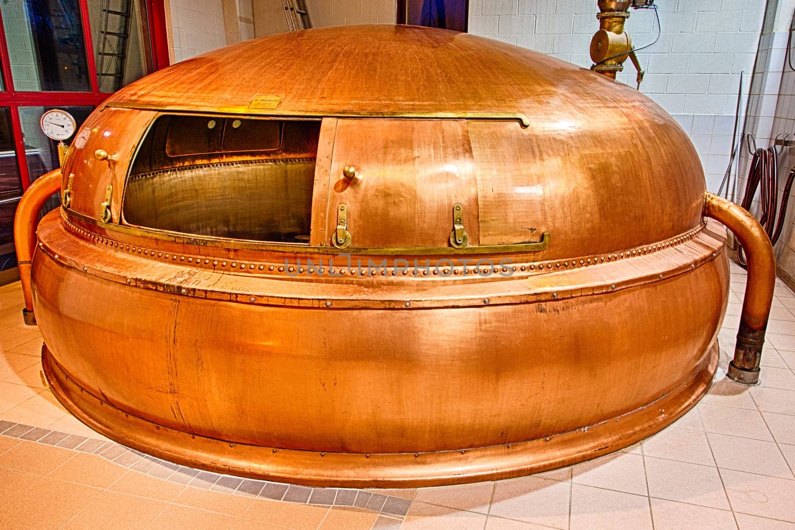 Traditional copper distillery tanks in a beer brewery