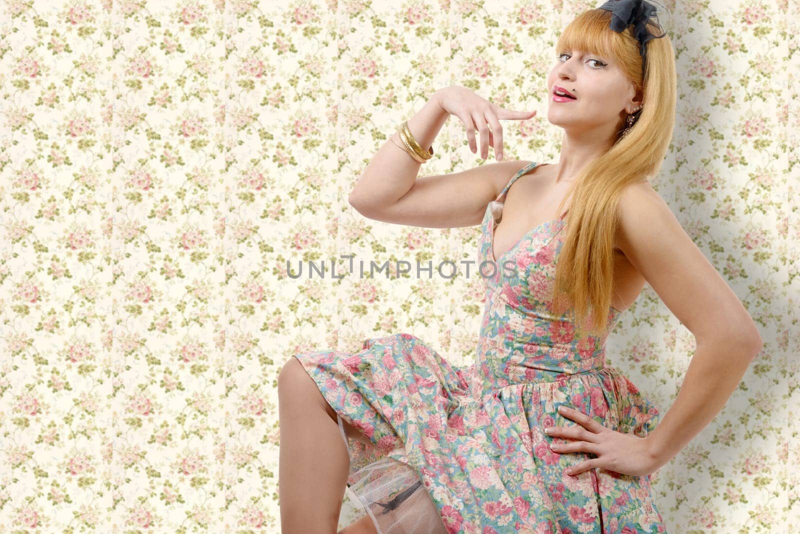 a young woman in retro floral dress
