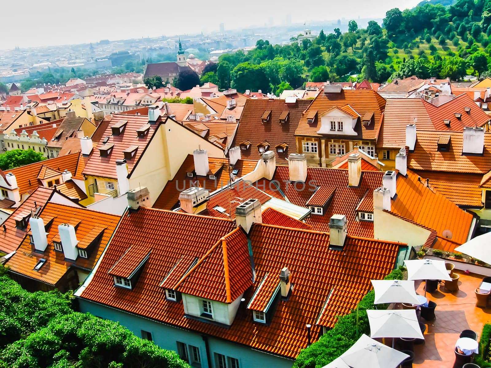 View from above to tiled roofs of old town, panorama of Prague, Czech republic