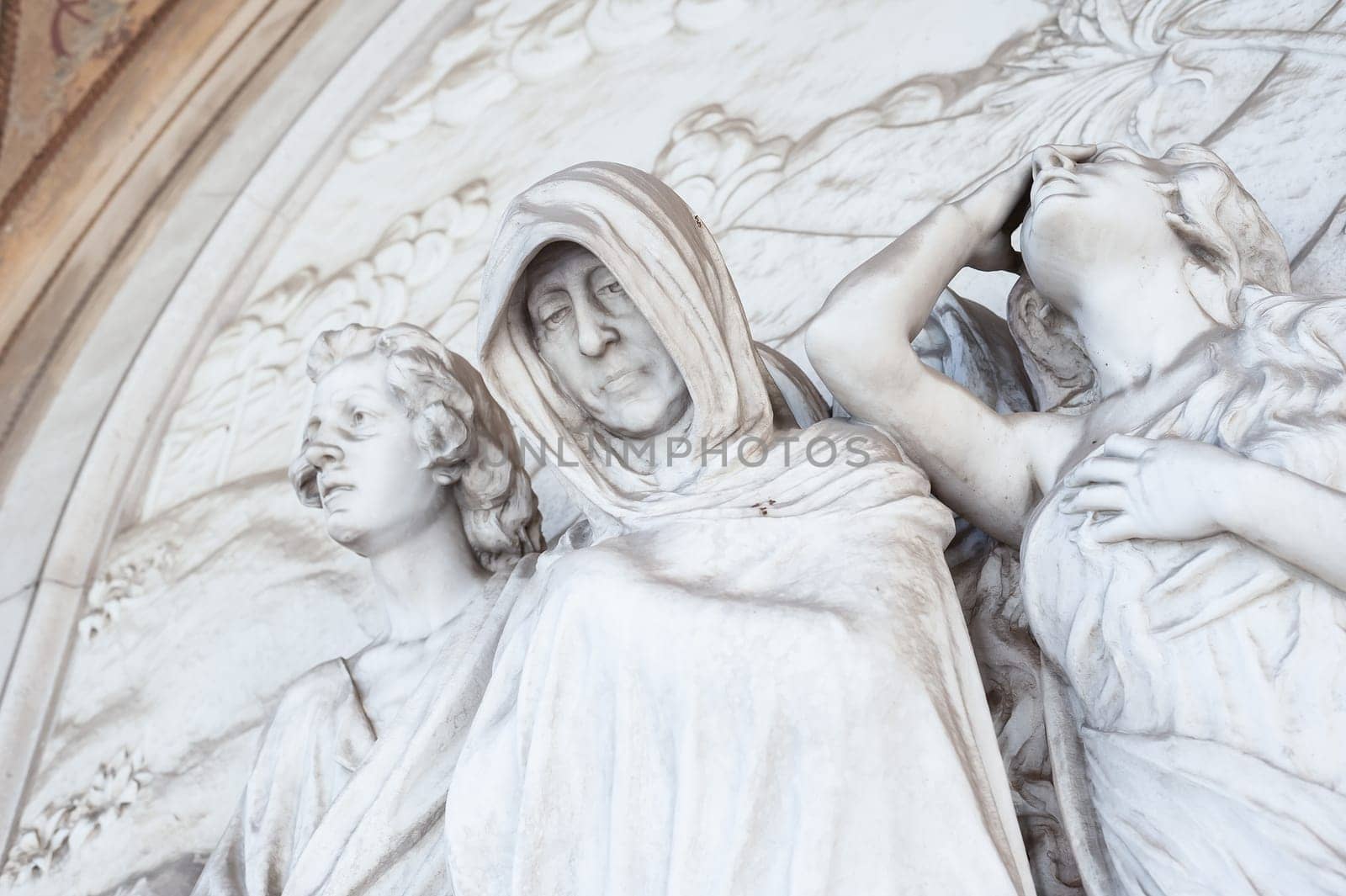 More than 100 years old statue. Cemetery located in North Italy.