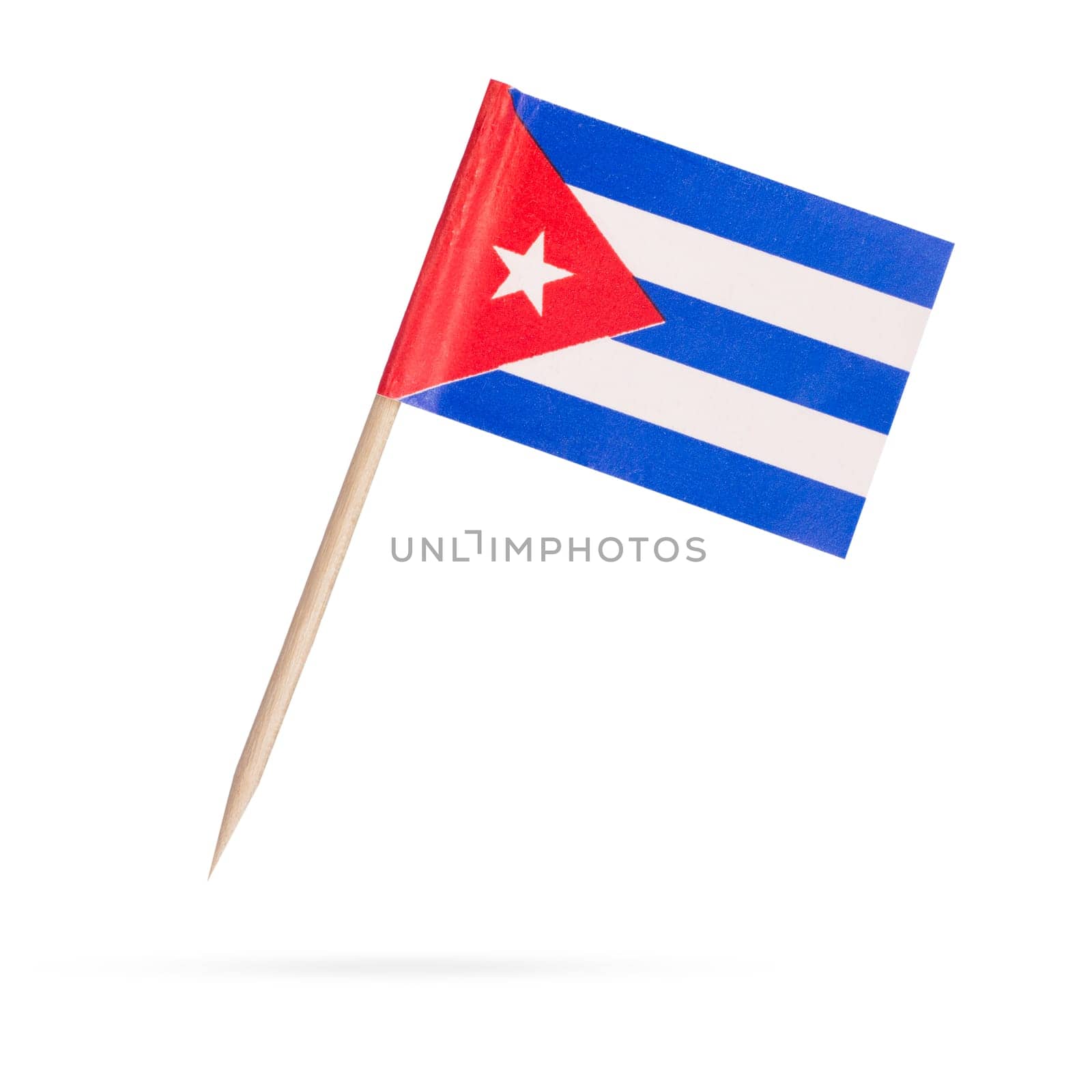 Miniature paper flag Cuba. Isolated Cuban flag pointer on white background. With shadow below