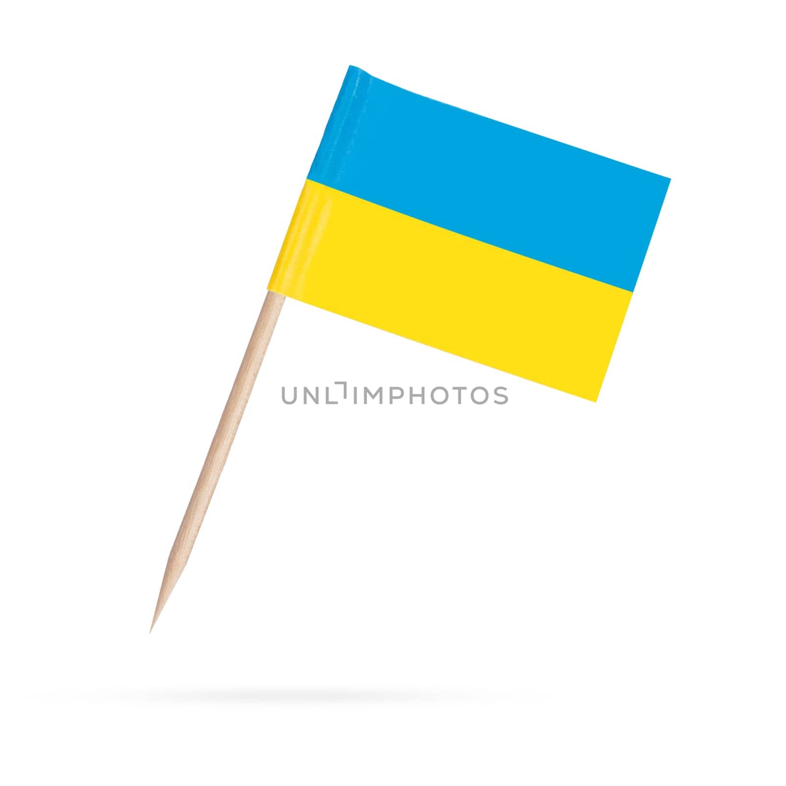 Miniature paper flag Ukraine. Isolated mini Ukrainian flag pointer on white background. With shadow below