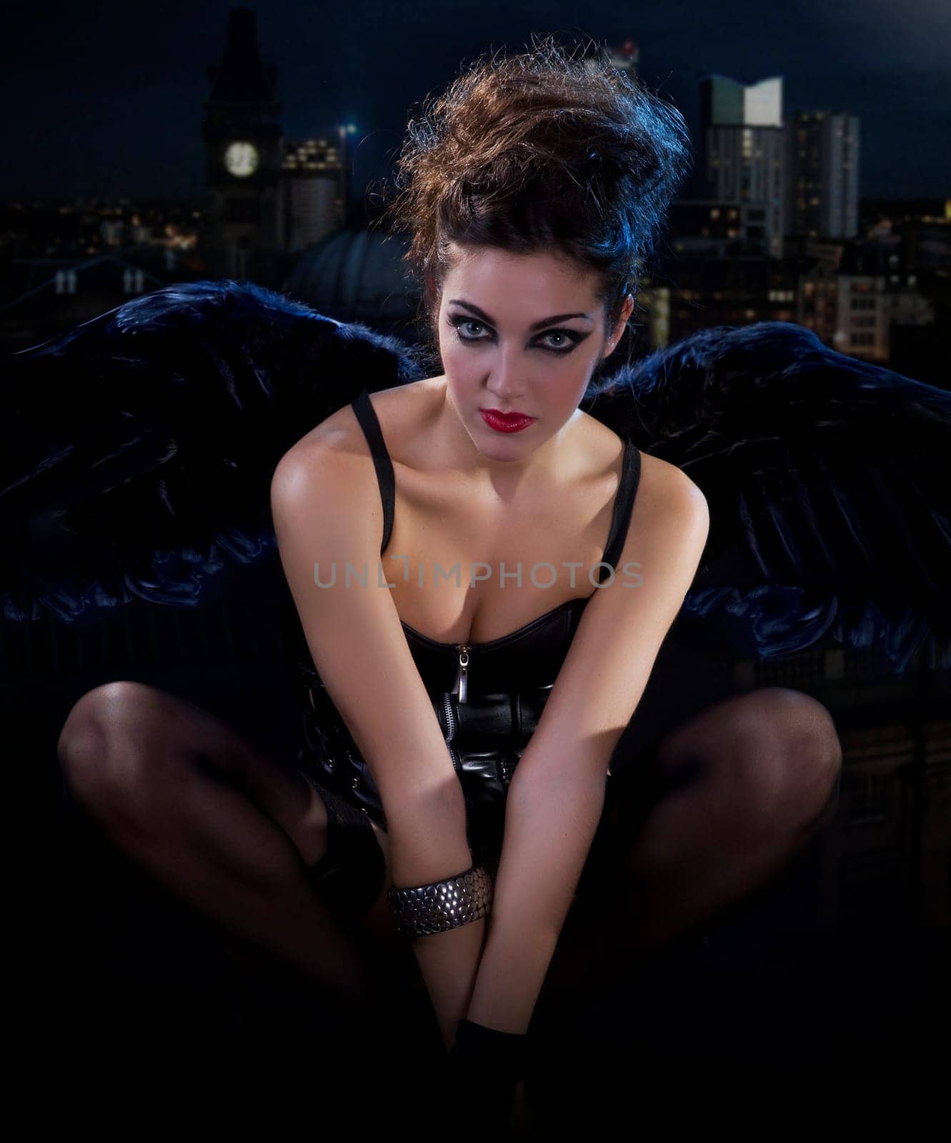 sensual woman in a costume in her knees