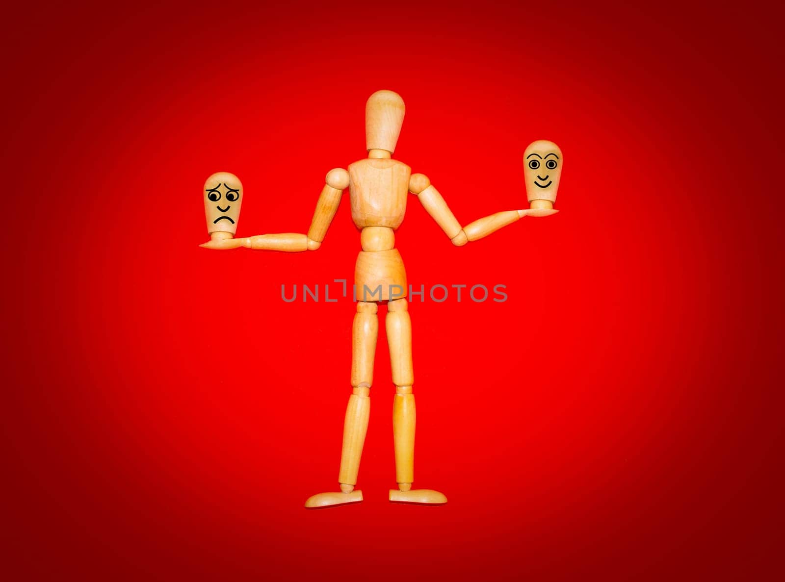 The wooden figure and various human emotions on red