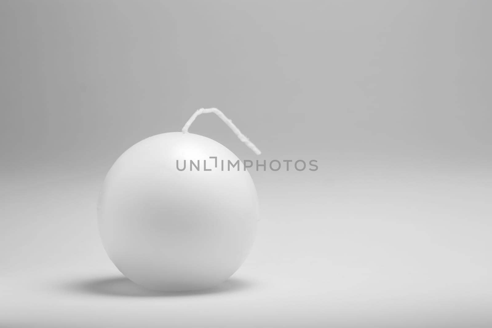 One candle isolated on white background
