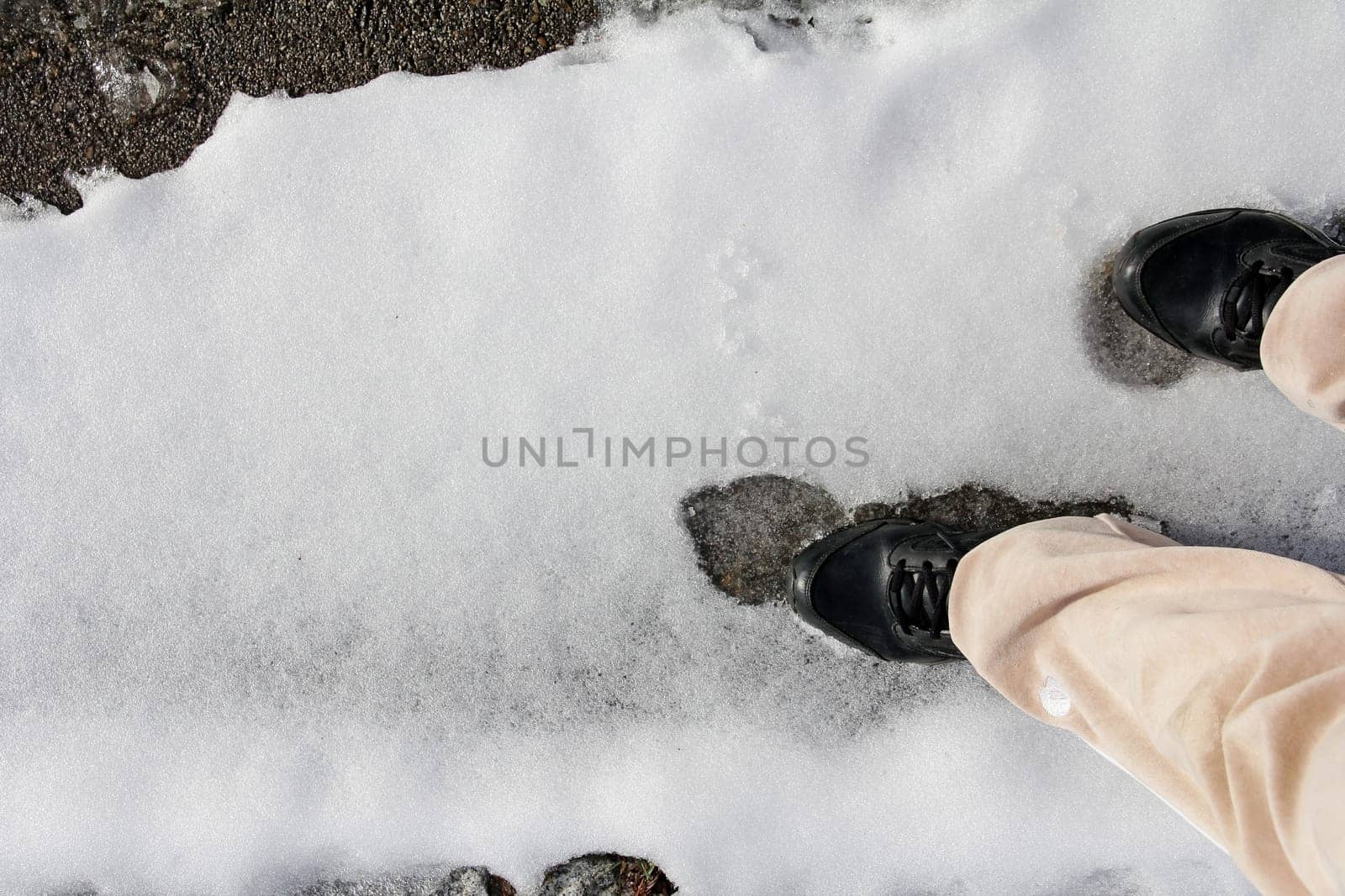 Risk of slipping on snow-slick road