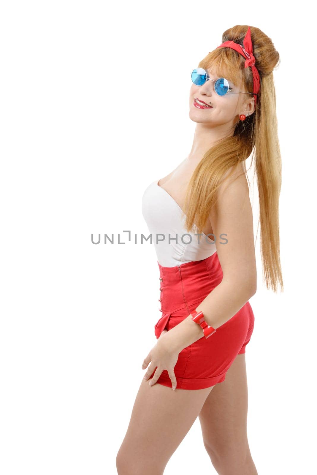 a pretty girl pin-up in shorts on white background