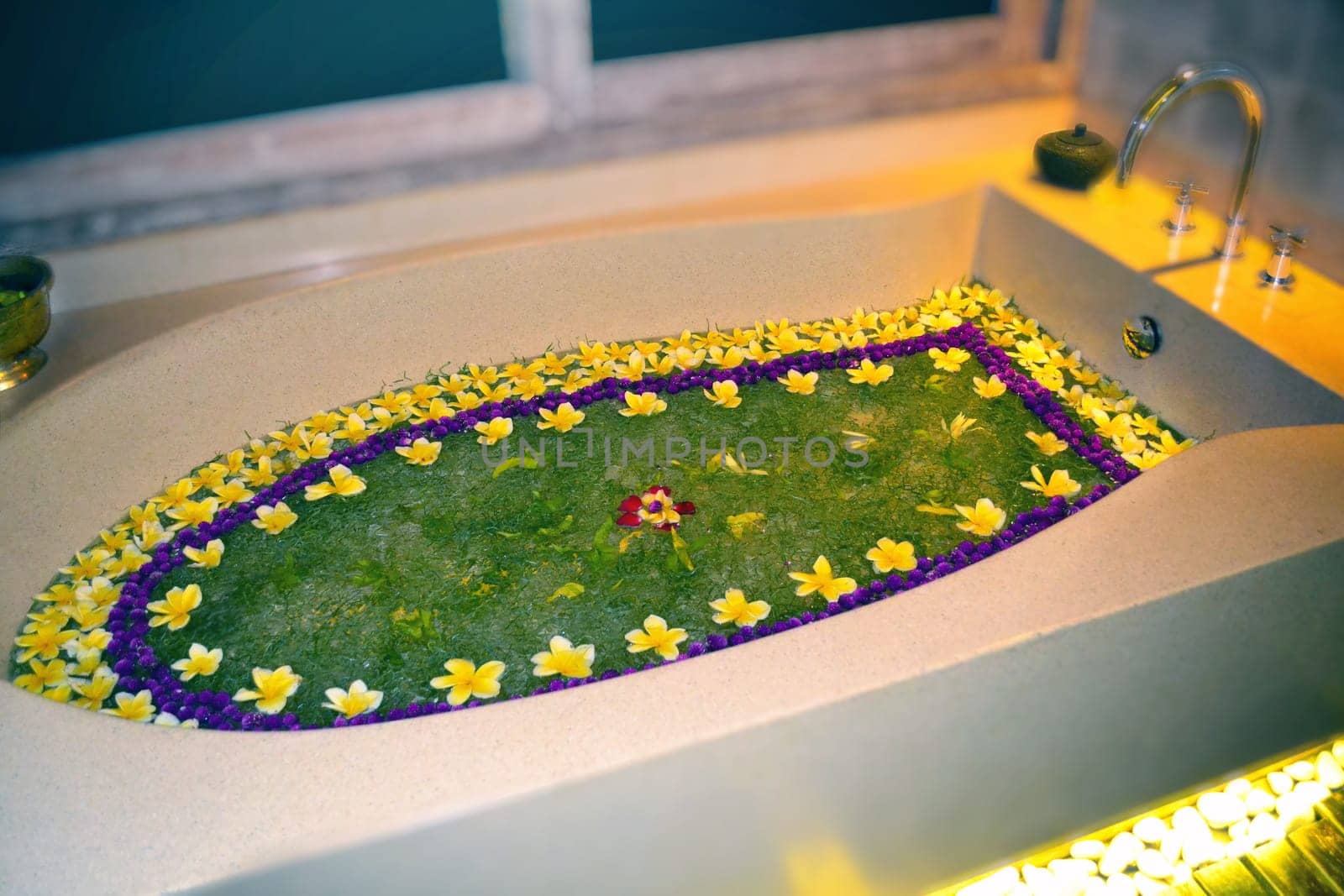 Frangipani Fantasy Bath in a Hotel Room