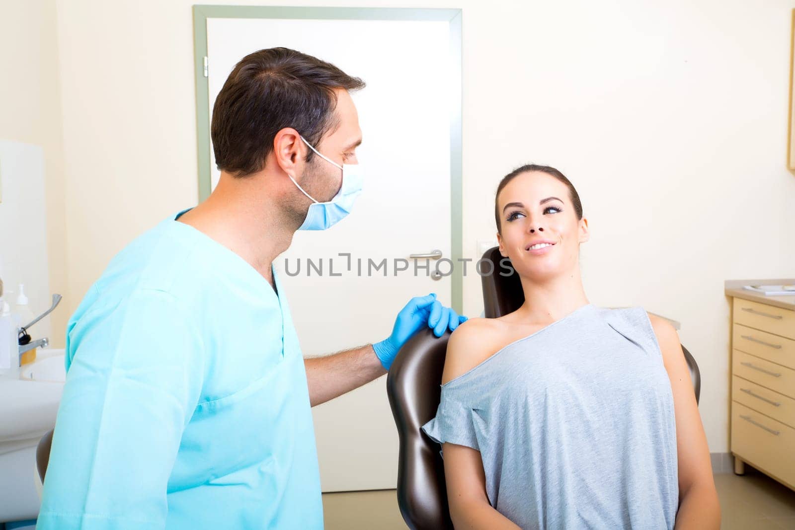 A young woman at her Dentists appointment..