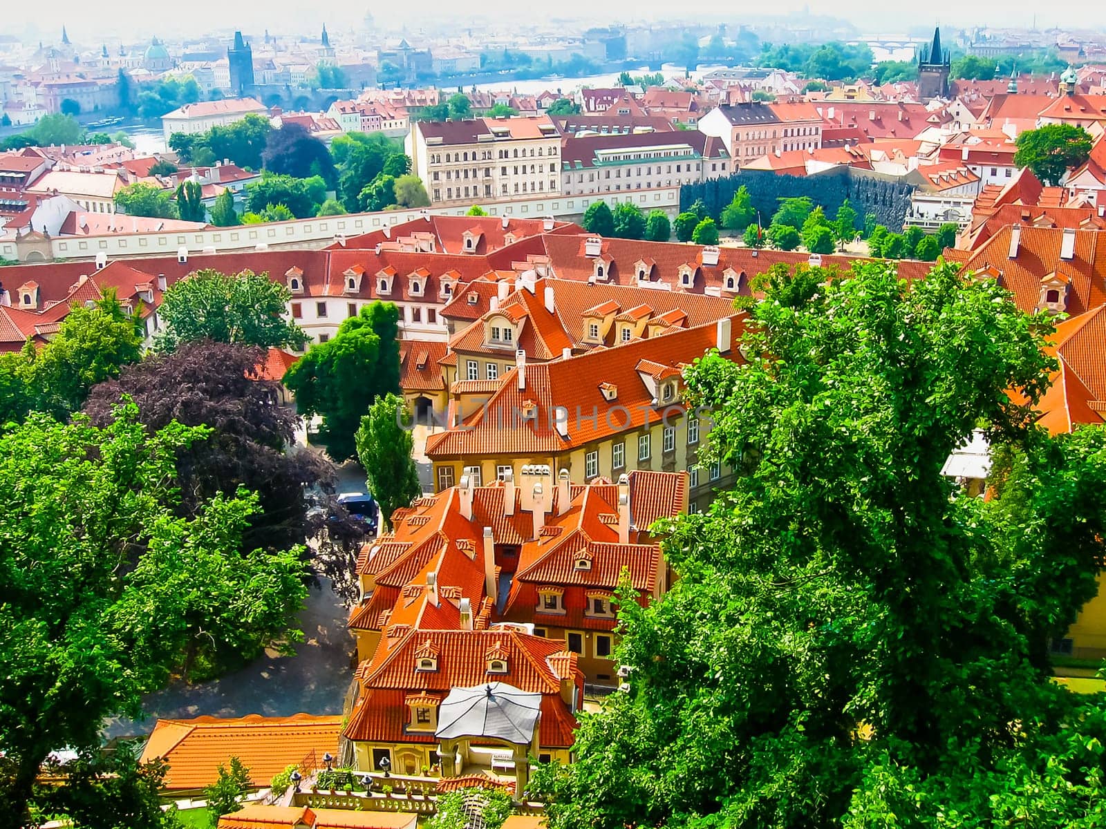 View from above to tiled roofs of old town, panorama of Prague, Czech republic