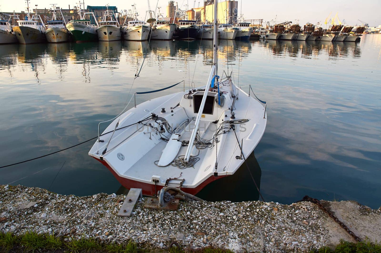 Motor Italian boat on the offshore berth Italy