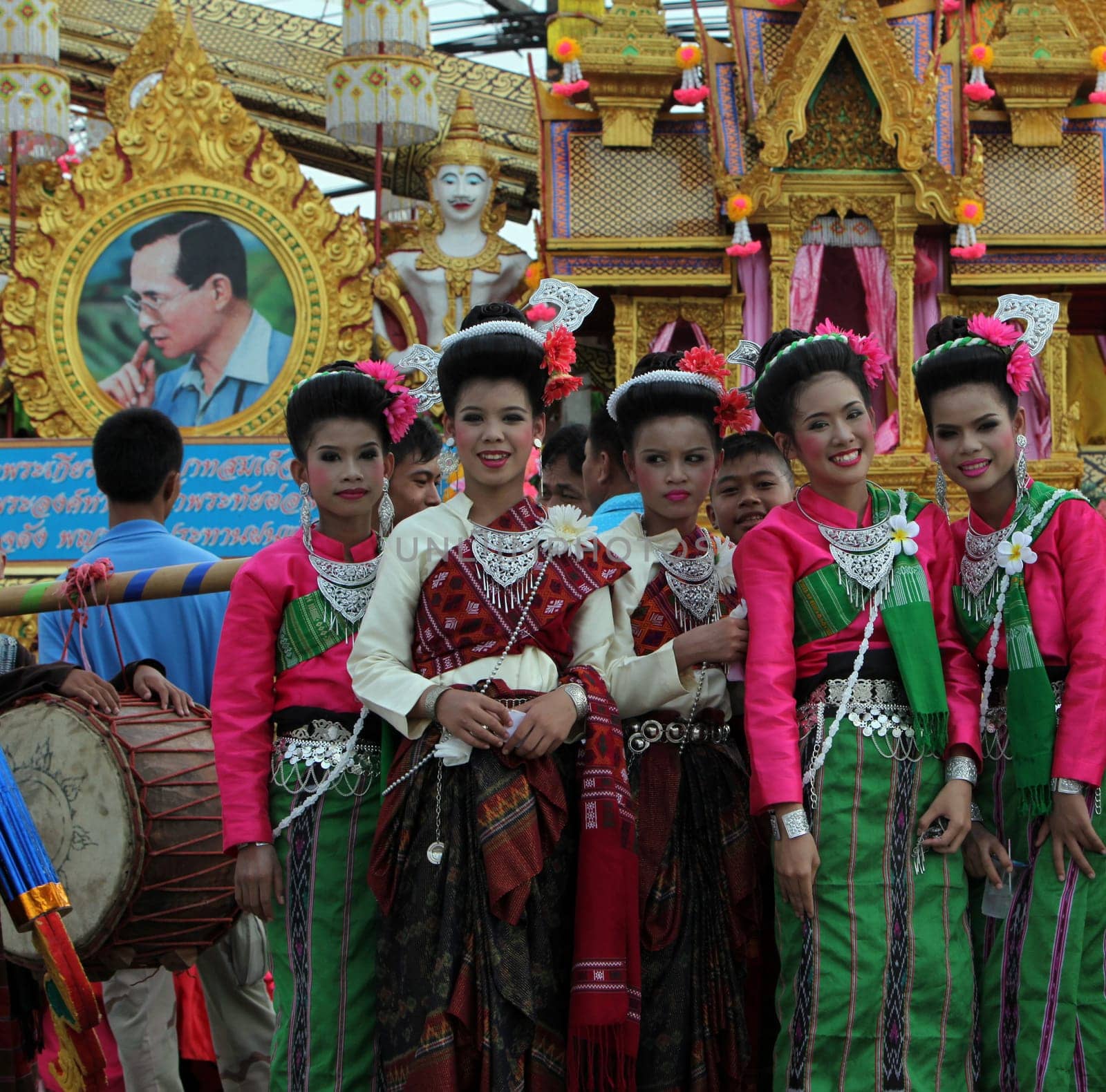 a pictures of the King Bhumibol on a traditional parade at the Raketfestival in the city of Yasothon in Thailand in Southeastasia.