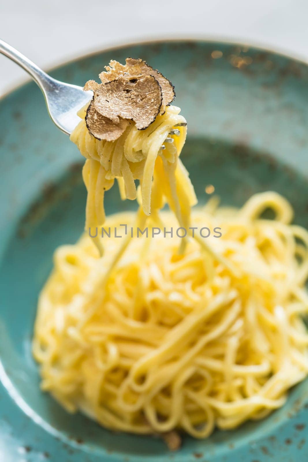 Dish of pasta with truffle. selective focus. close-up