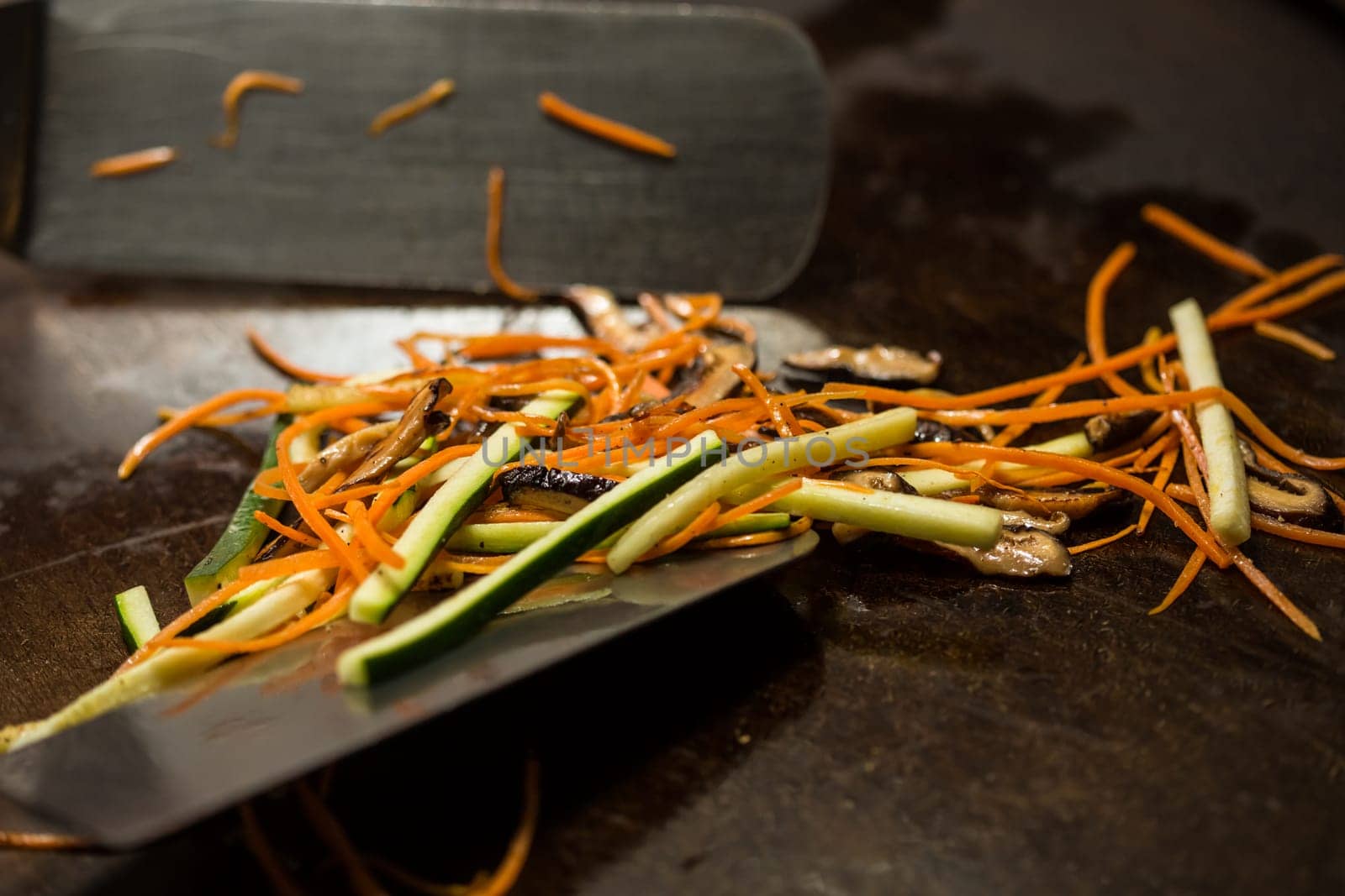 Preparing pad thai at a street hawker mobile restaurant in Bangkok, Thailand. Fried noodle. Shallow dof.