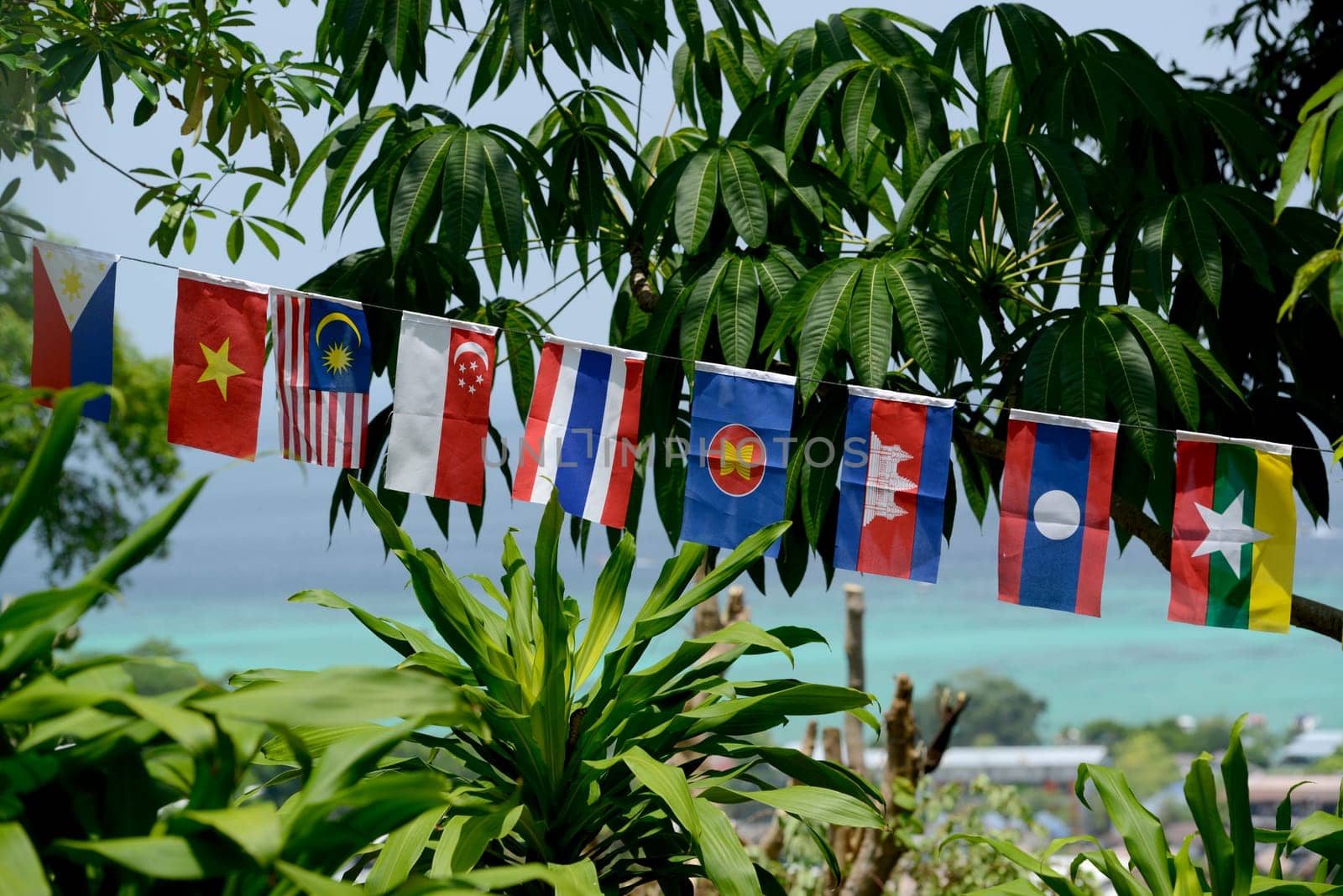 Flags of the ASEAN Nations in the Town of Ko PhiPhi on Ko Phi Phi Island outside of the City of Krabi on the Andaman Sea in the south of Thailand.