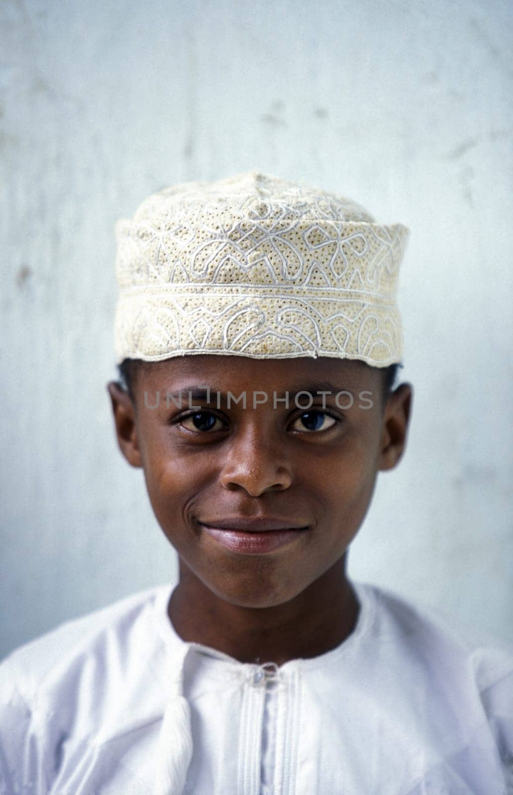a boy in the city of Moutsamudu on the Island of Anjouan on the Comoros Ilands in the Indian Ocean in Africa.