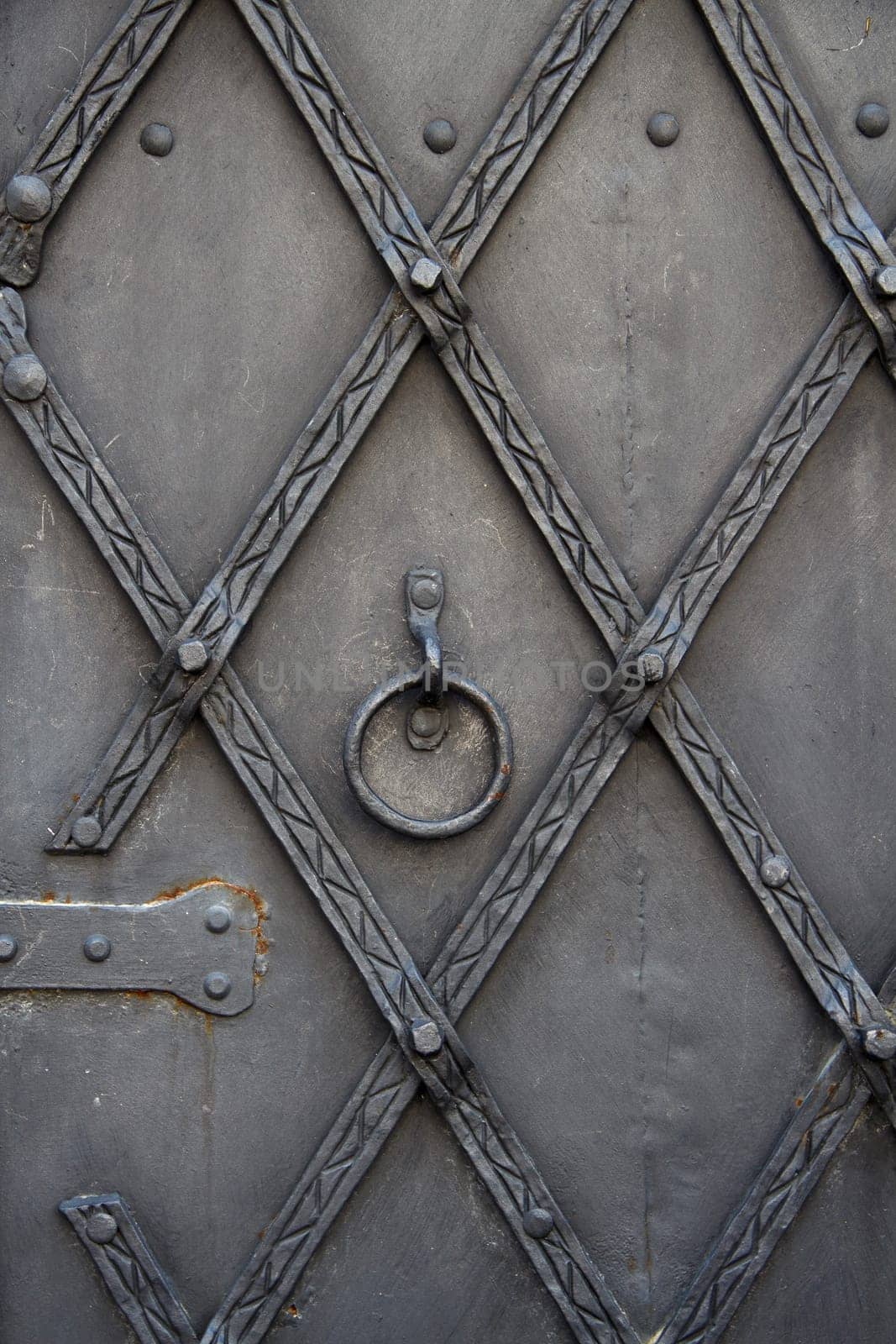 Part of an antique metallic doortexture
