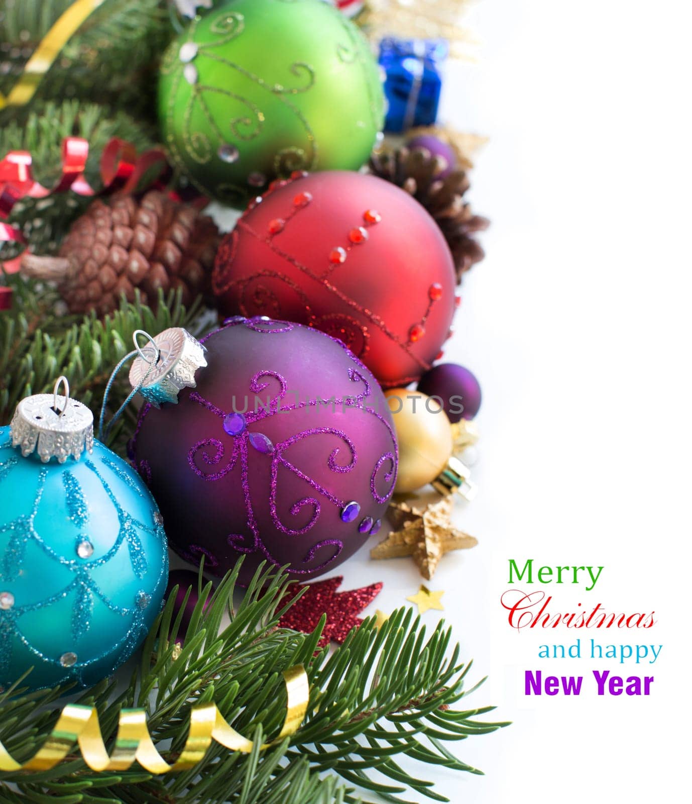 Colorful Christmas decorations - baubles, stars and pine conesisolated on white