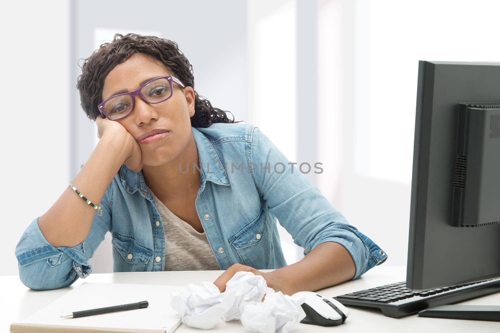 an American African business woman tired in his office