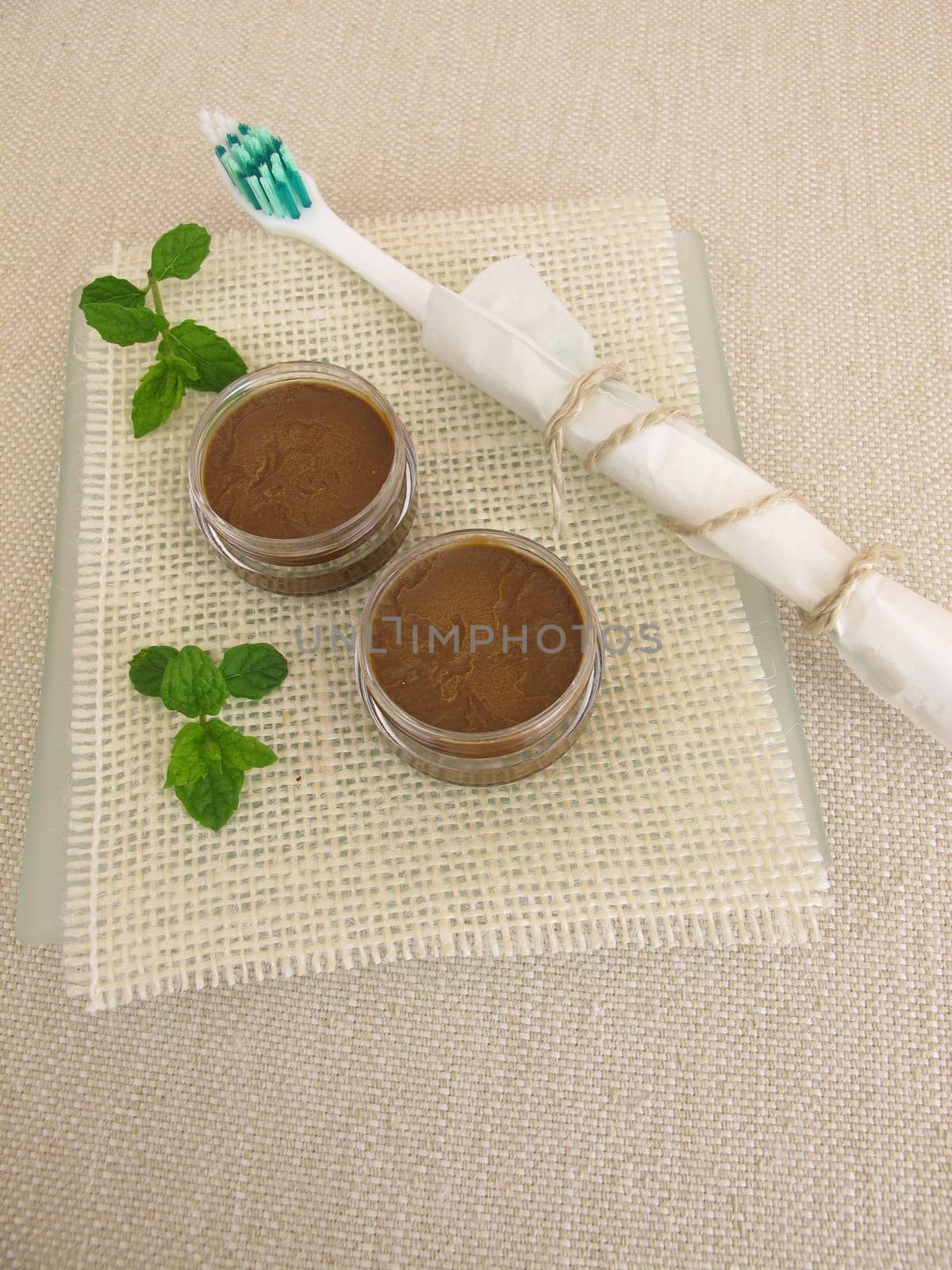 Homemade toothpaste from coconut oil,healing earth powder and peppermint oil