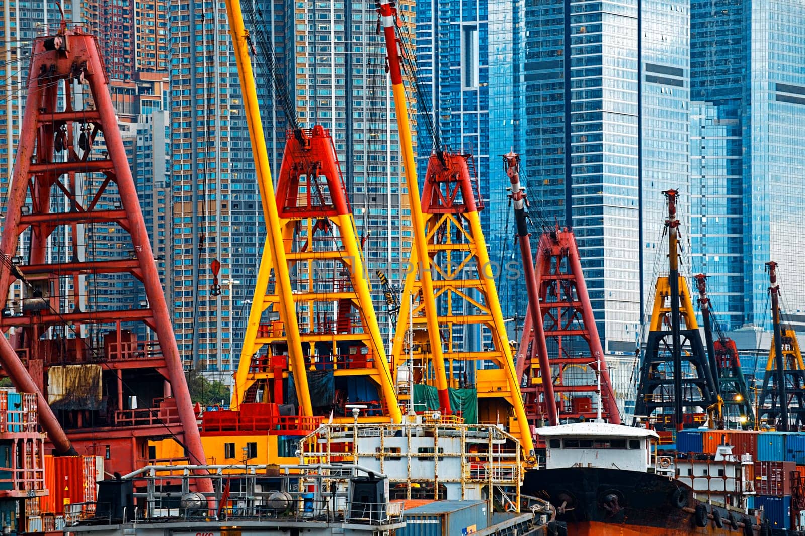 International Commerce Center ICC Building Kowloon Hong Kong Harbor with cargo ship