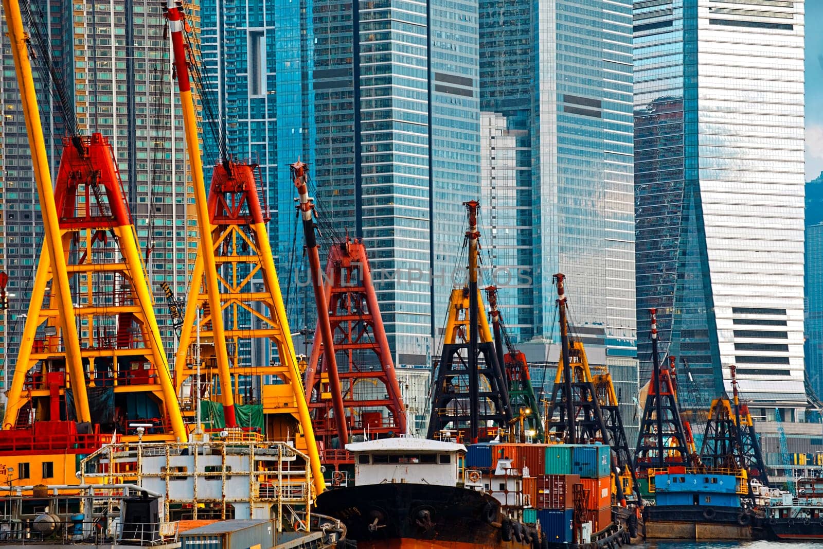 International Commerce Center ICC Building Kowloon Hong Kong Harbor with cargo ship