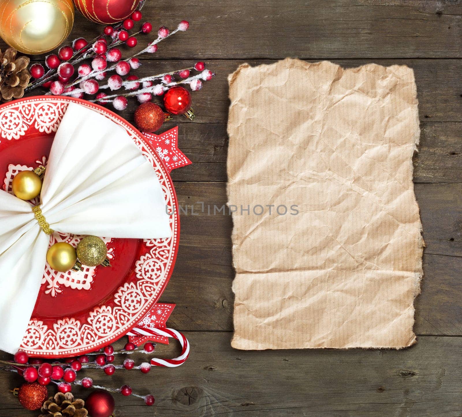Festive table setting with Christmas decorations on wooden table