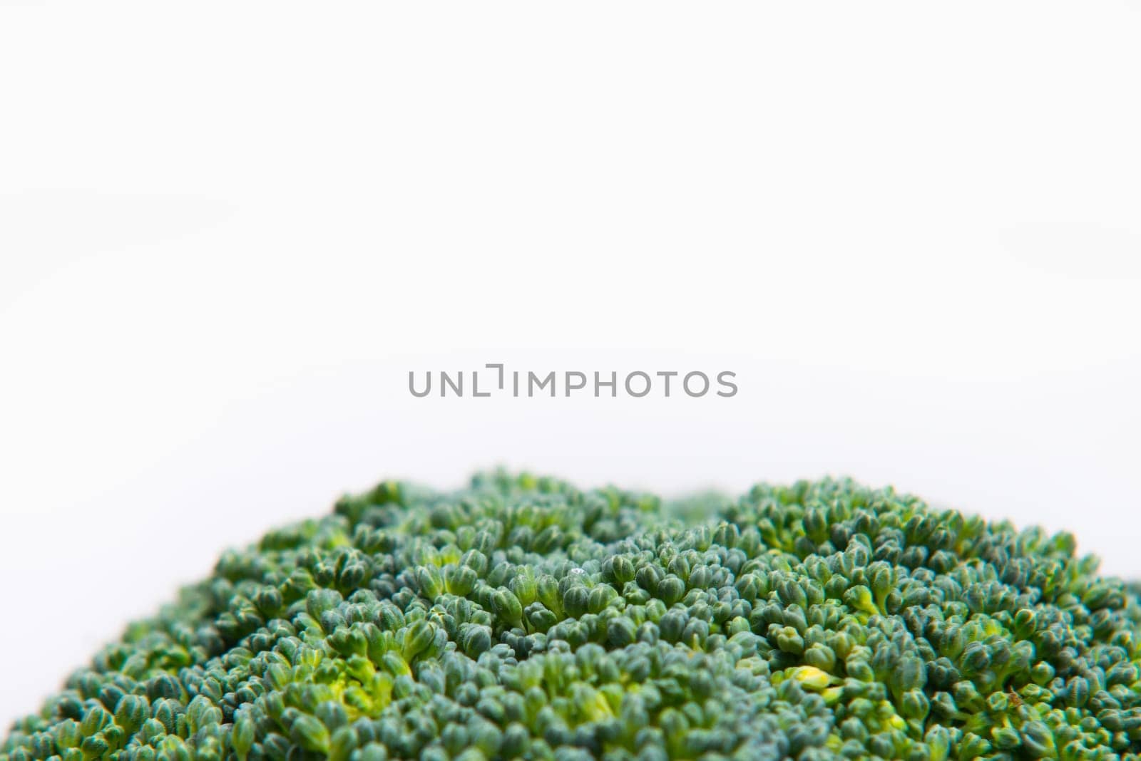 close up on fresh broccoli solated on a white background
