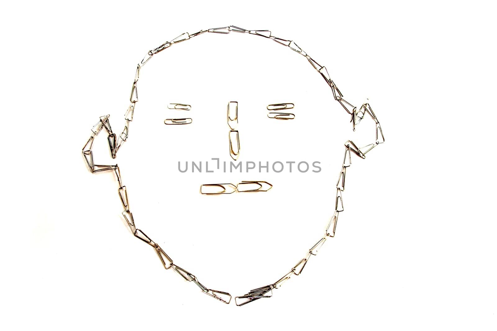 An abstract sketch of a face created with a chain of paper clips, isolated on white