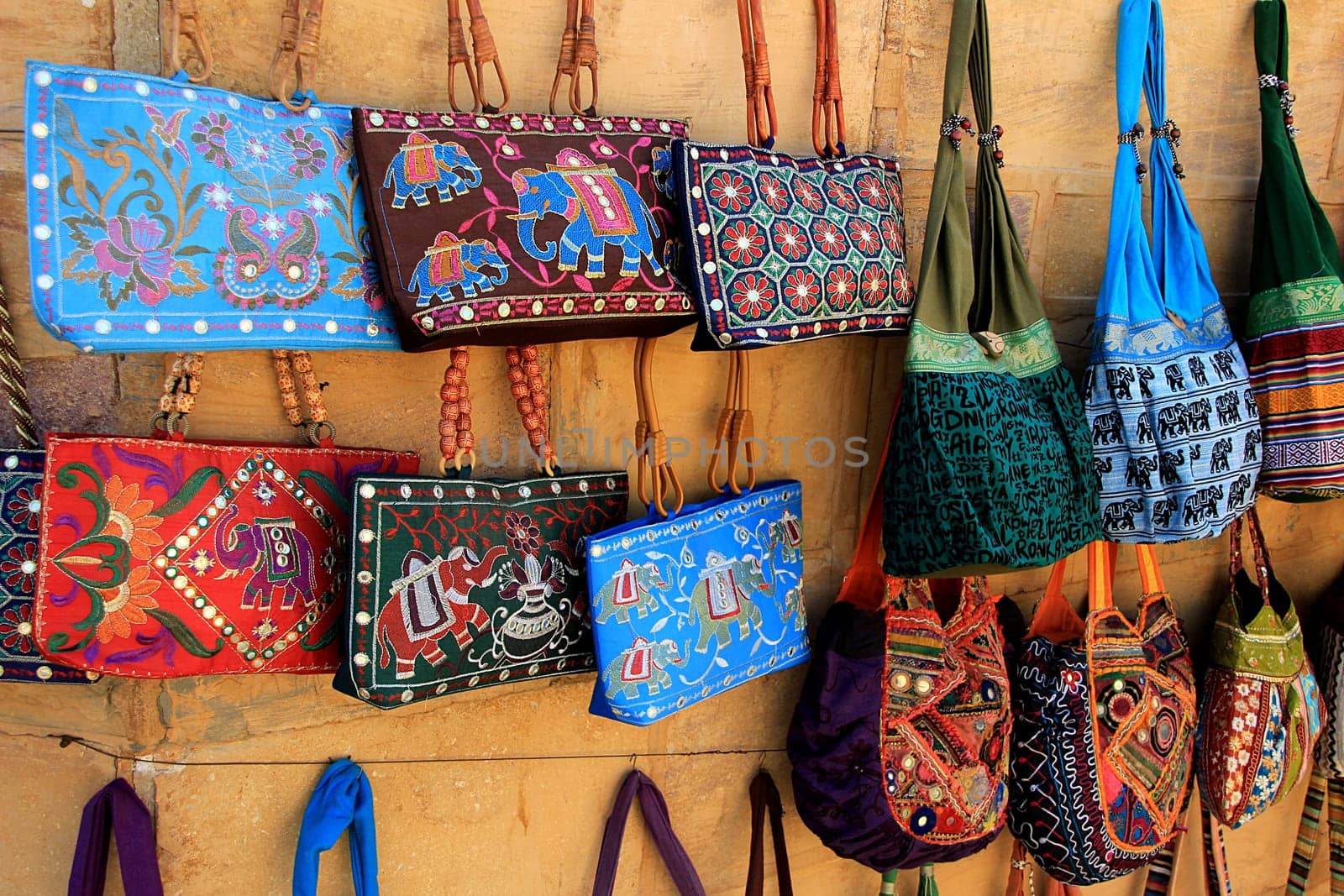 Colorful, hand embroidered purses and handbags displayed at Patawon-ki-Haweli, Jaisalmer Fort, Jaisalmer, Rajasthan, India, Asia
