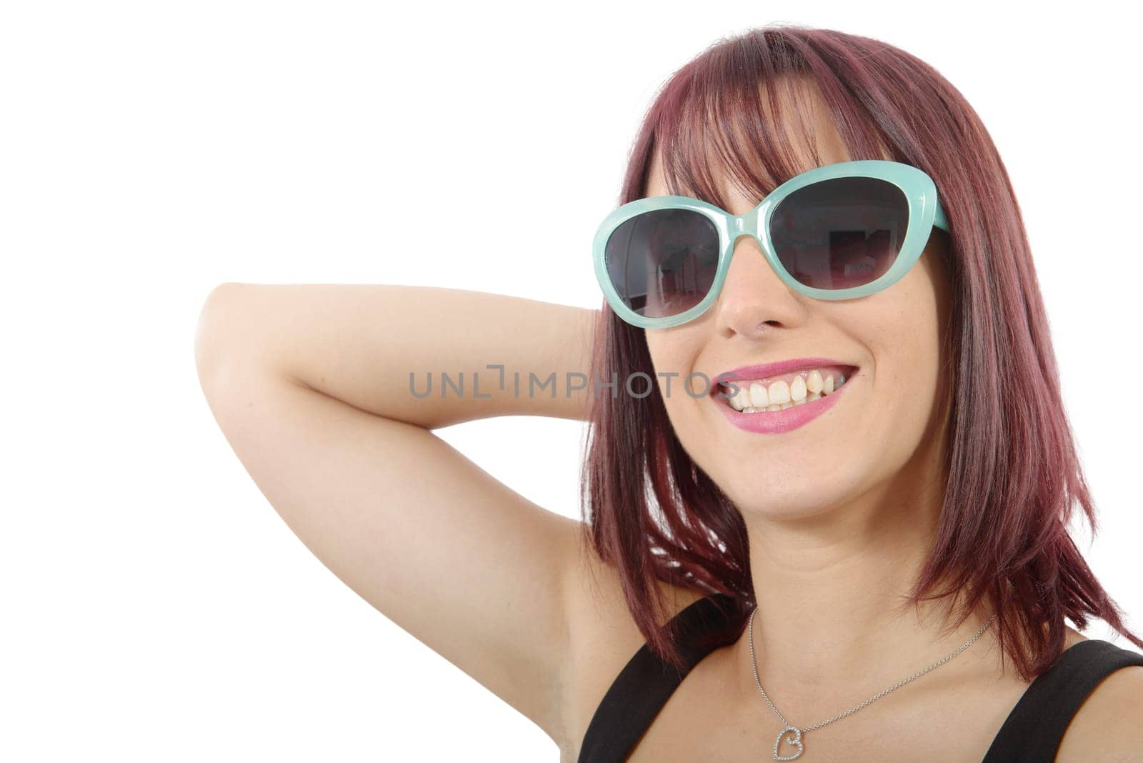 beautiful young redhead woman with sunglasses, on white