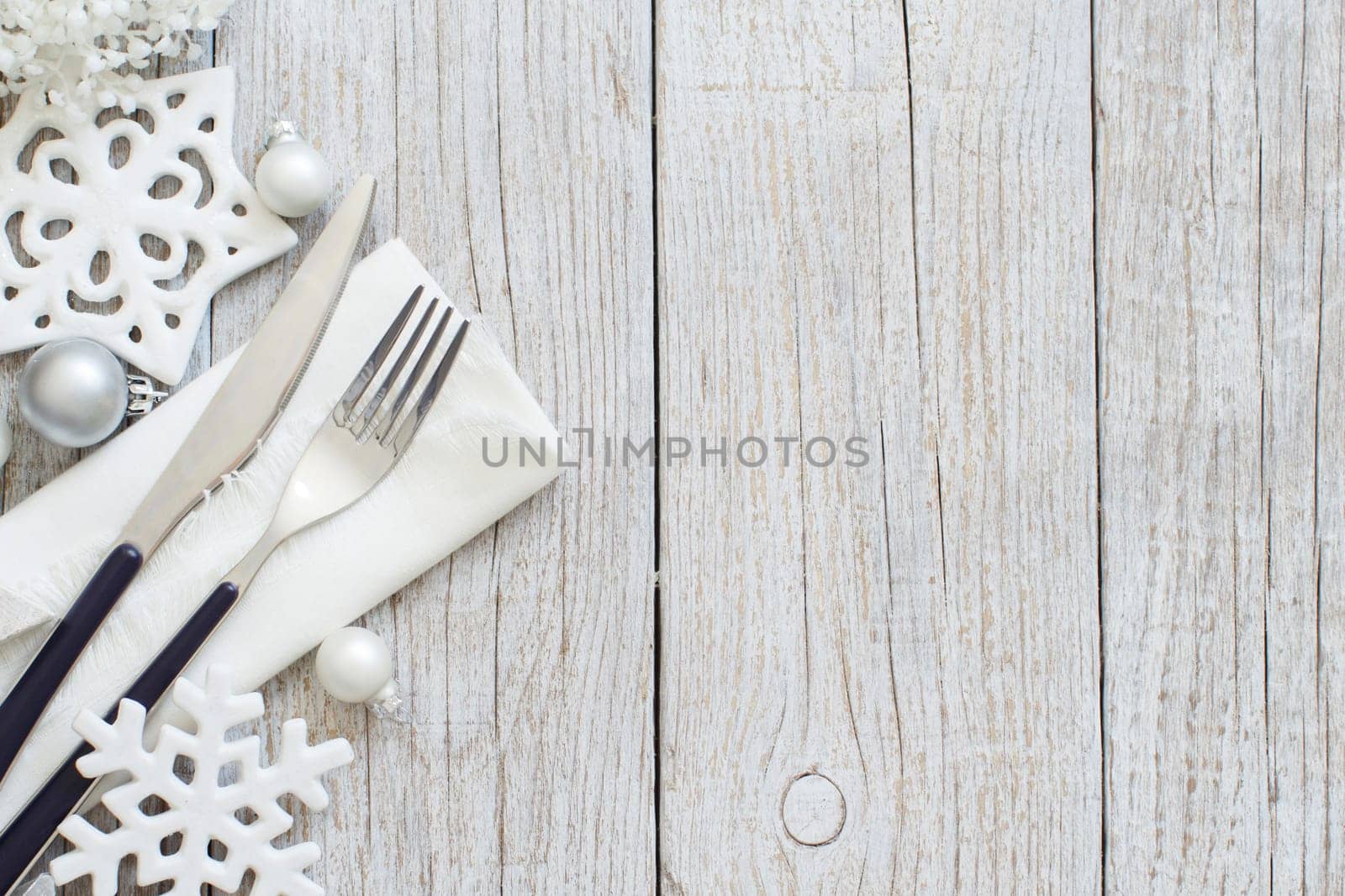 Silver pastel Christmas Table Setting with christmas decorations
