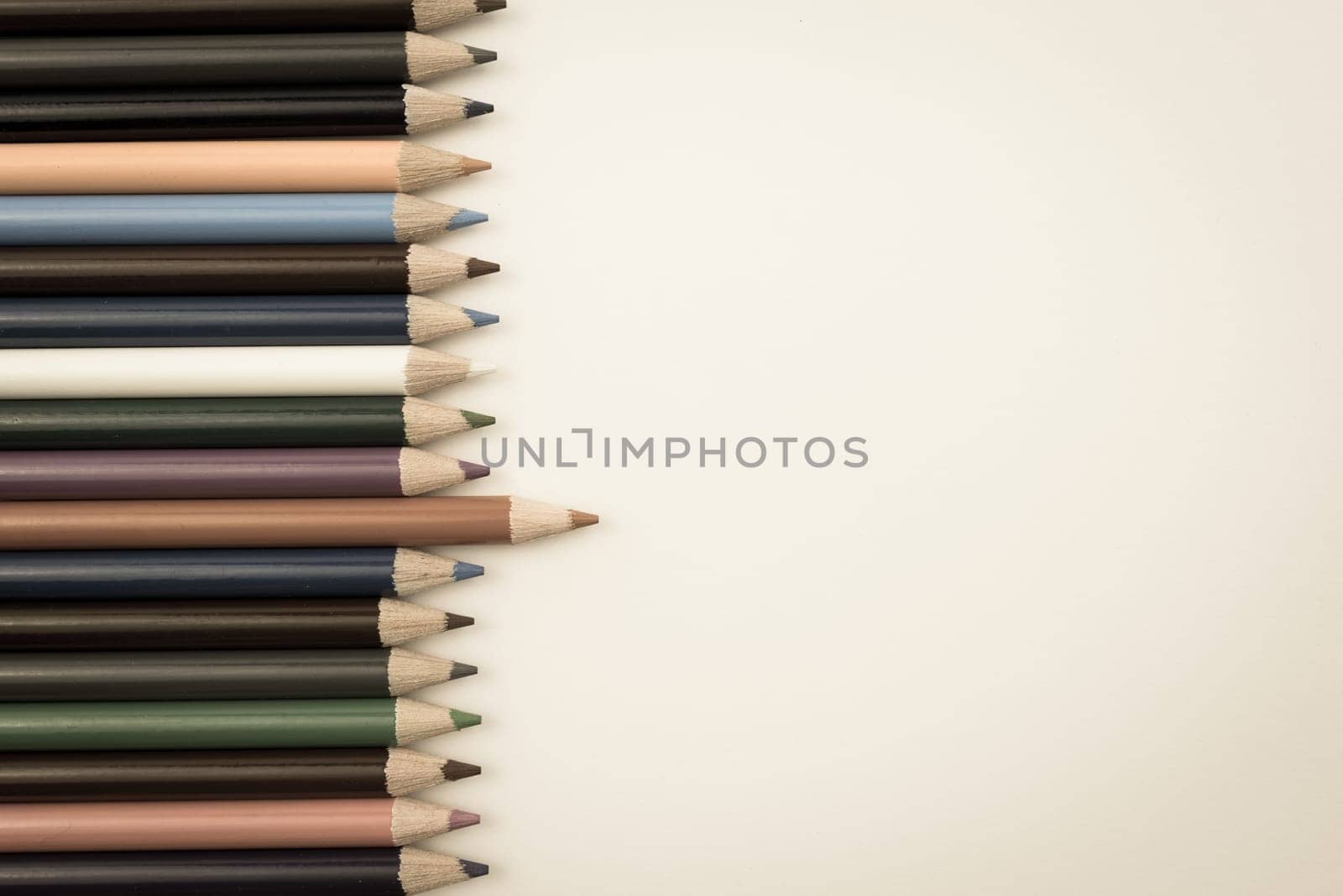 Colouring pencils isolated on white background,education concept image with copy space available. Vintage filter applied