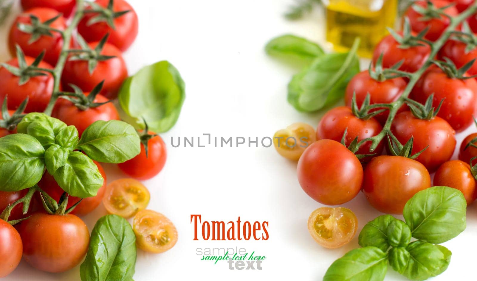 Cherry tomatoes and basil isolated on white background